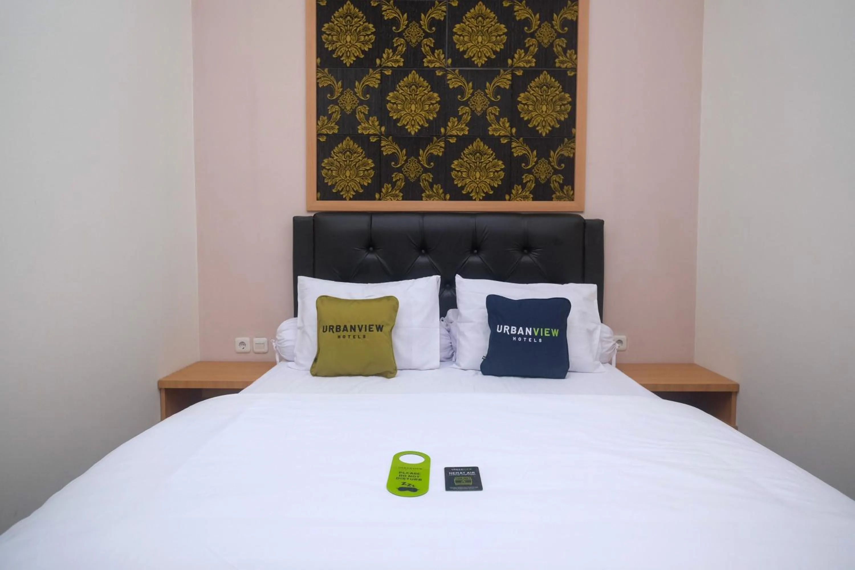 Bedroom, Bed in Urbanview Grand Lotus Hotel by RedDoorz