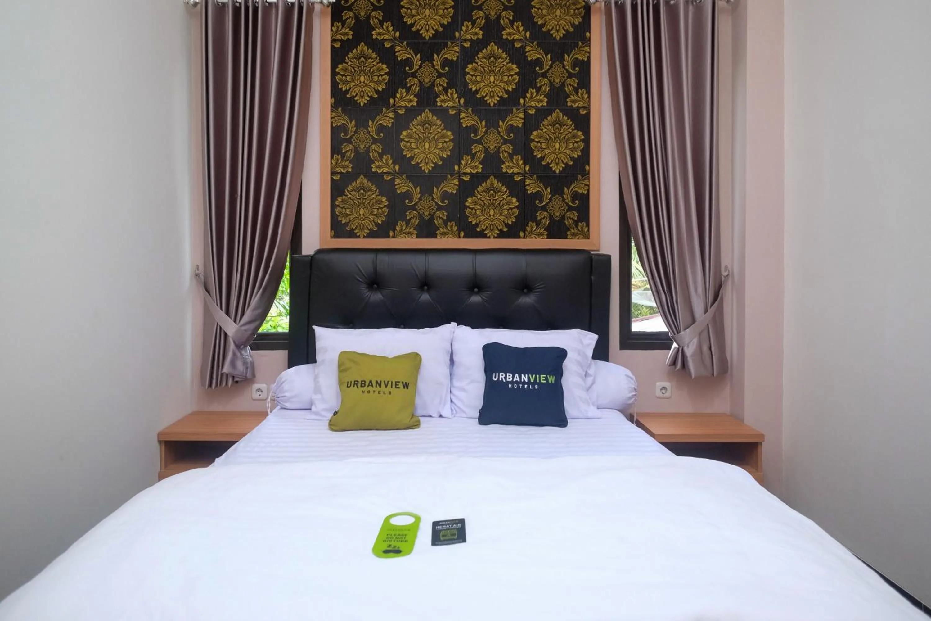 Bedroom, Bed in Urbanview Grand Lotus Hotel by RedDoorz