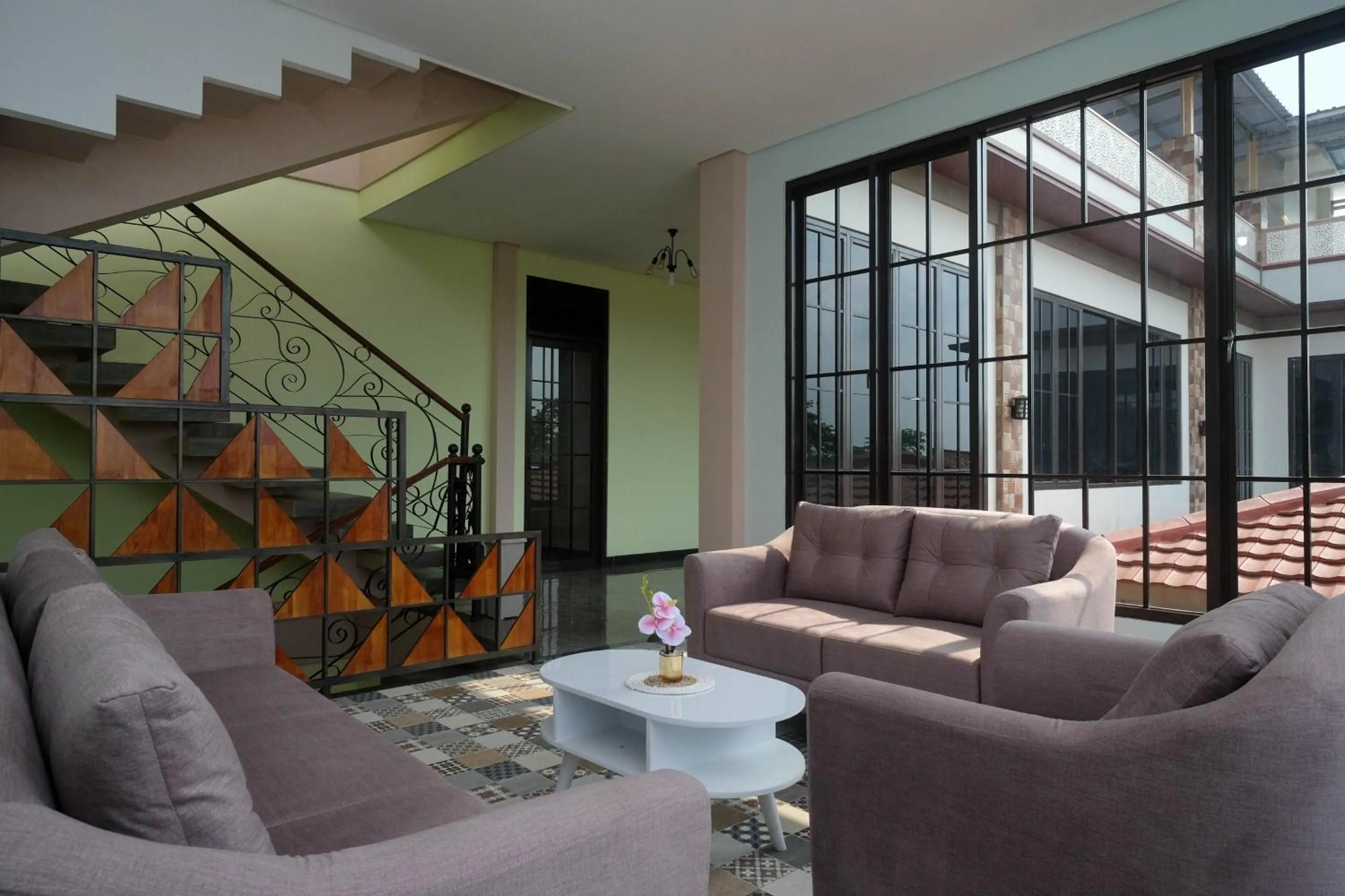 Seating area in Urbanview Grand Lotus Hotel by RedDoorz