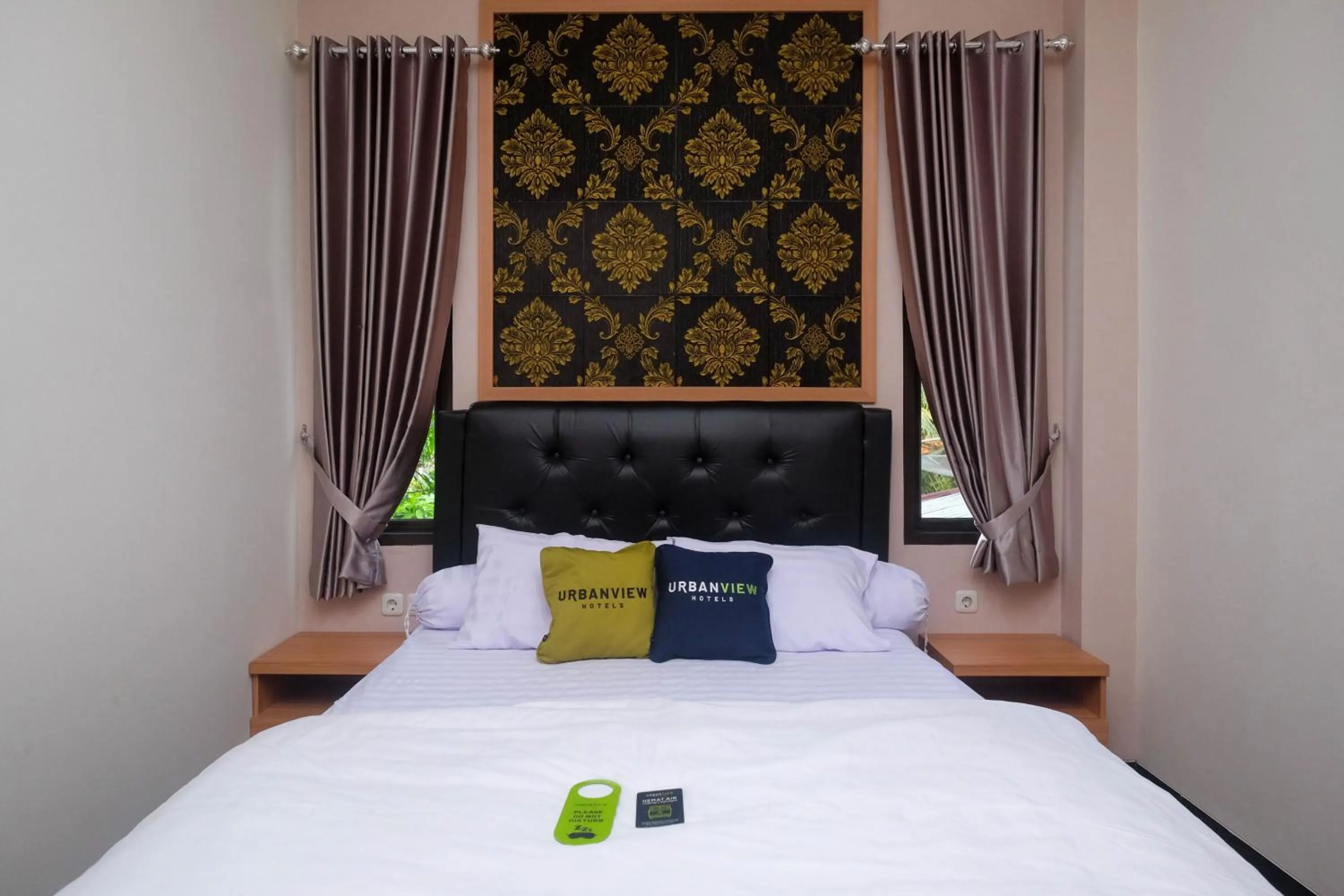 Bedroom, Bed in Urbanview Grand Lotus Hotel by RedDoorz