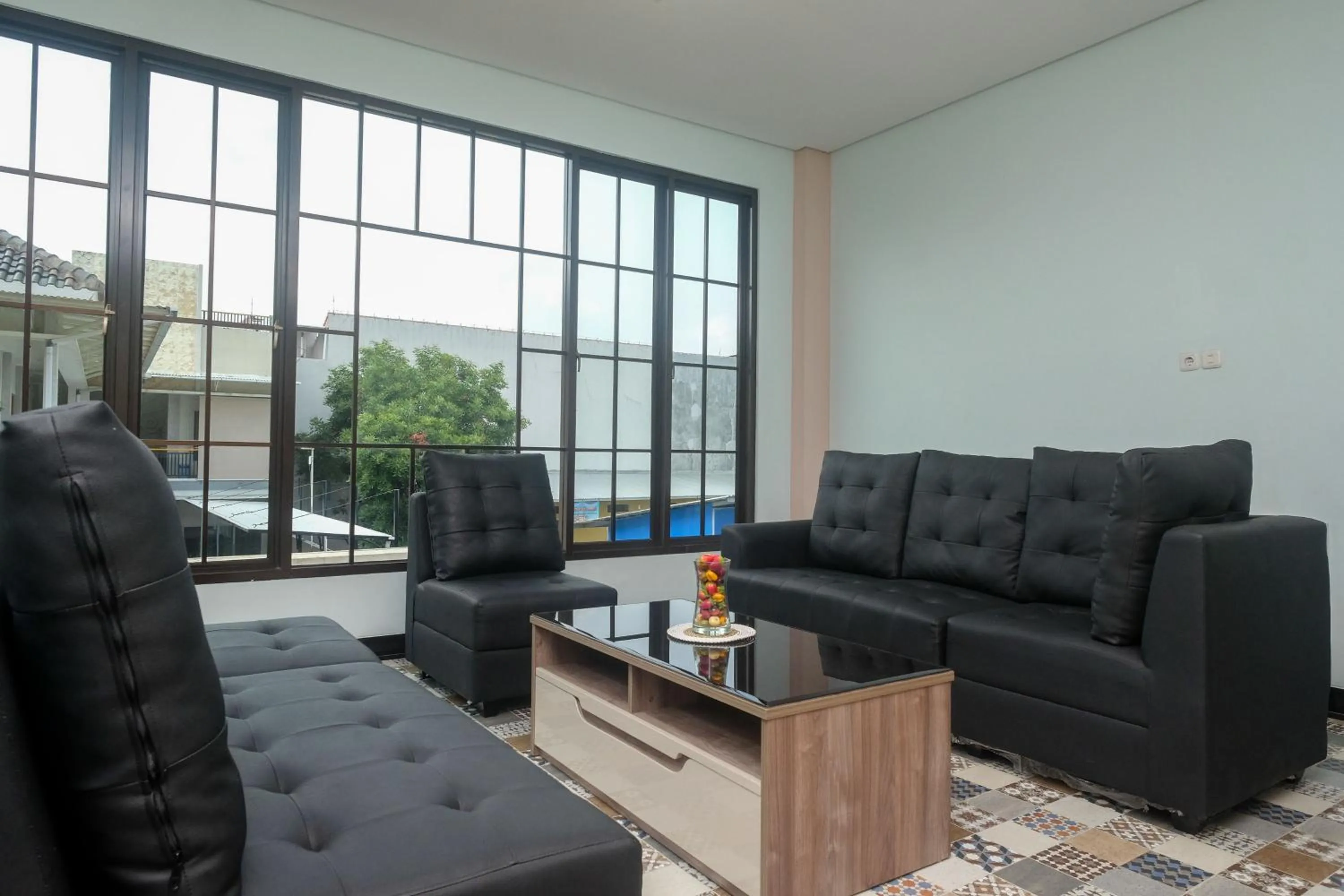 Seating area in Urbanview Grand Lotus Hotel by RedDoorz