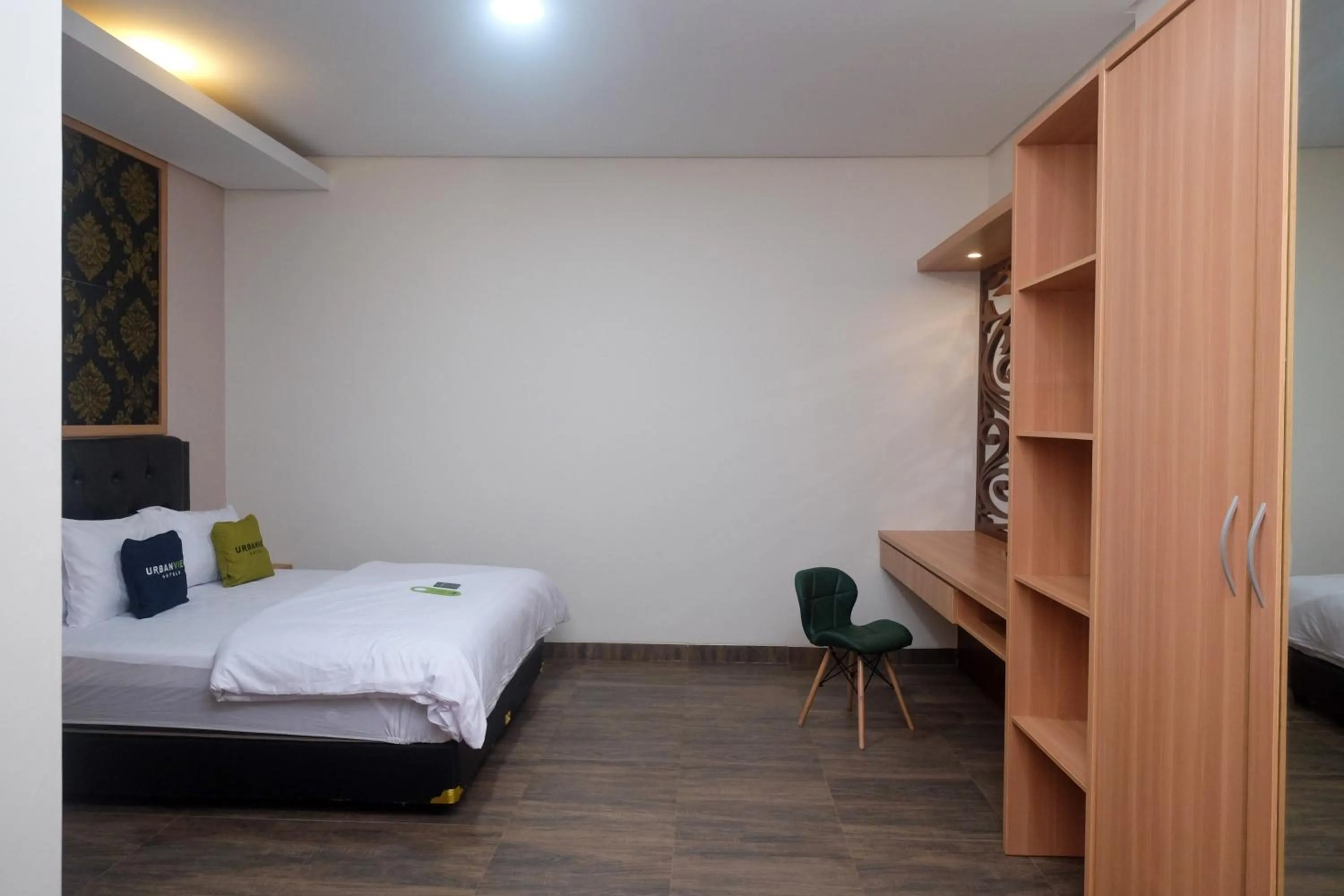 Bedroom, Bed in Urbanview Grand Lotus Hotel by RedDoorz