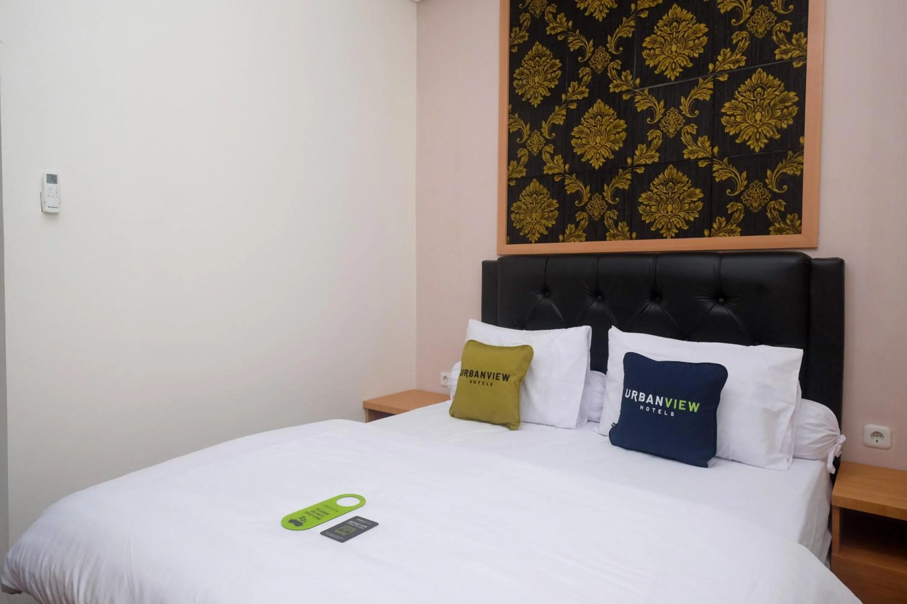 Bedroom, Bed in Urbanview Grand Lotus Hotel by RedDoorz