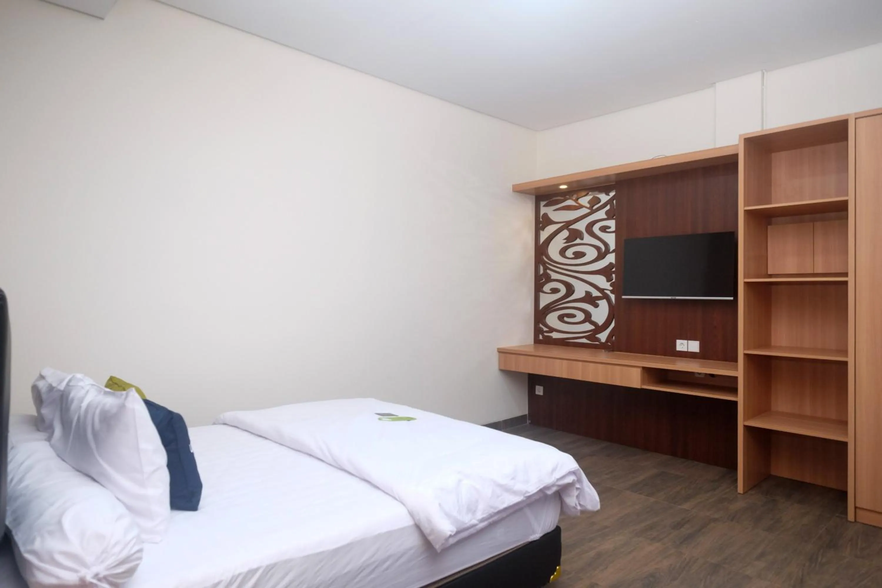 Bedroom, Bed in Urbanview Grand Lotus Hotel by RedDoorz