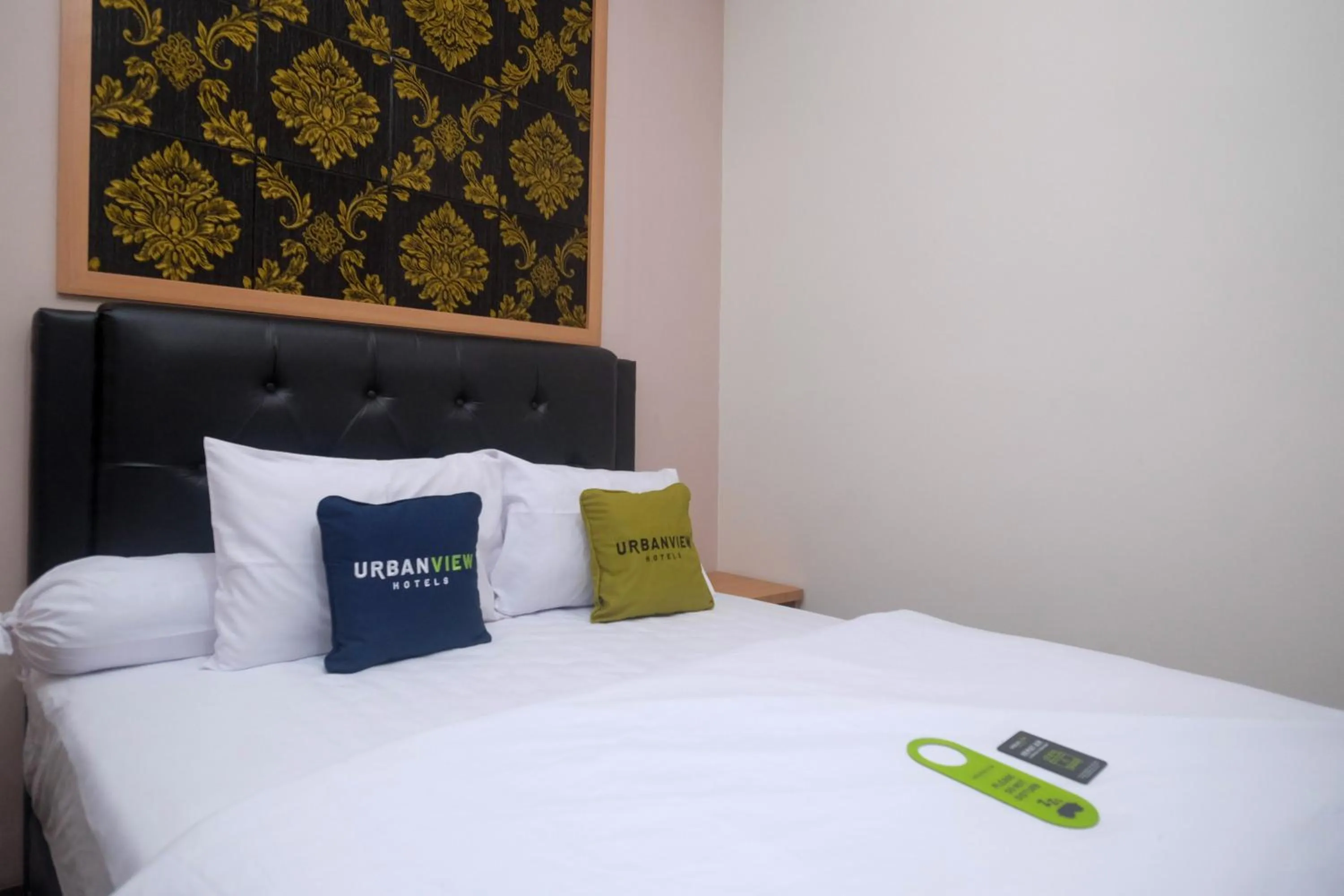 Bedroom, Bed in Urbanview Grand Lotus Hotel by RedDoorz