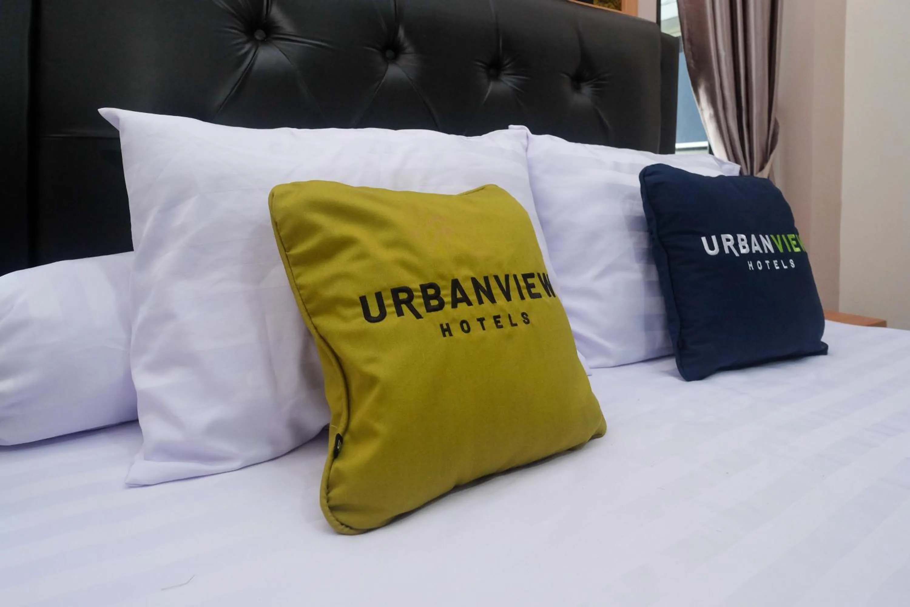 Bedroom, Bed in Urbanview Grand Lotus Hotel by RedDoorz