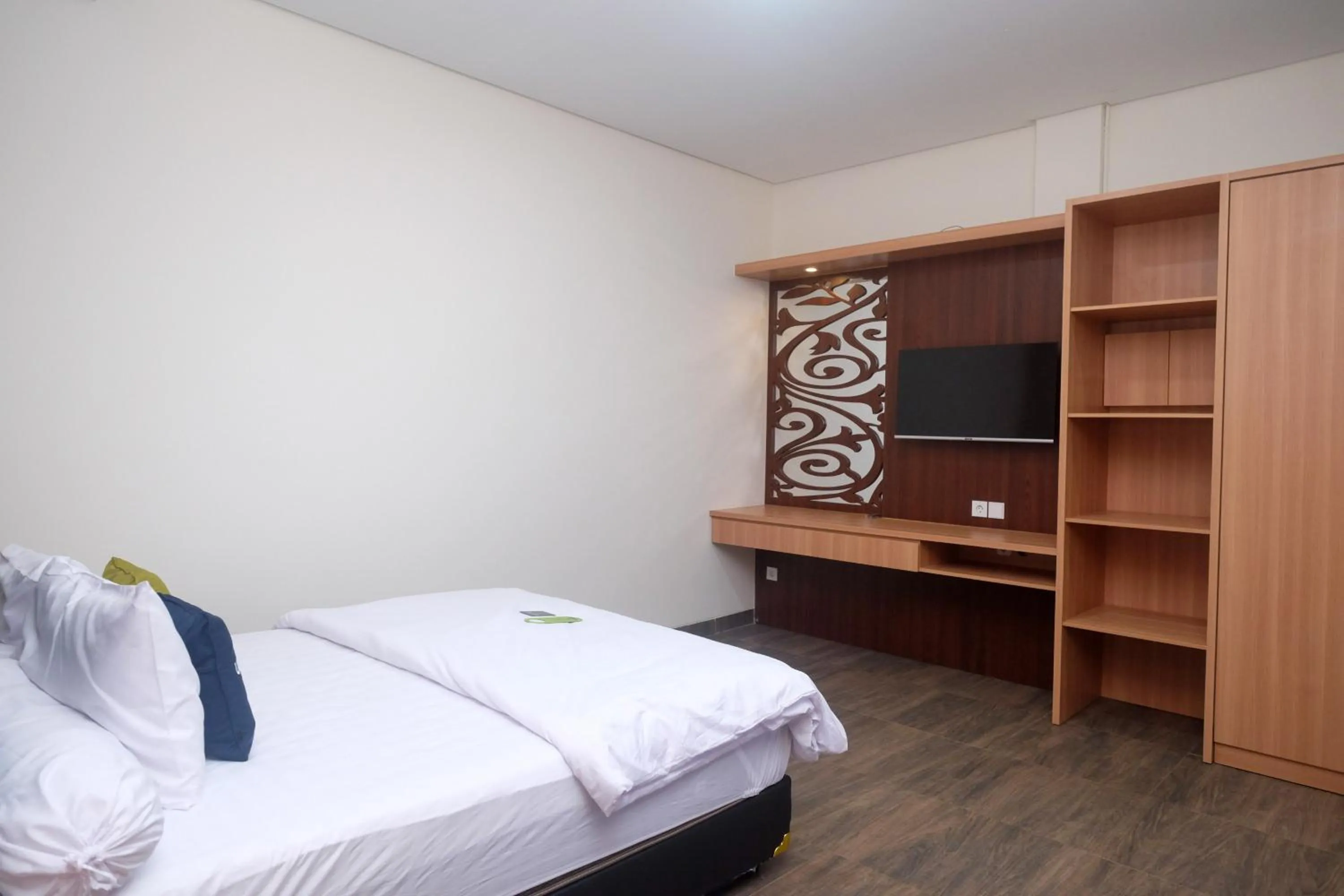 Bedroom, Bed in Urbanview Grand Lotus Hotel by RedDoorz