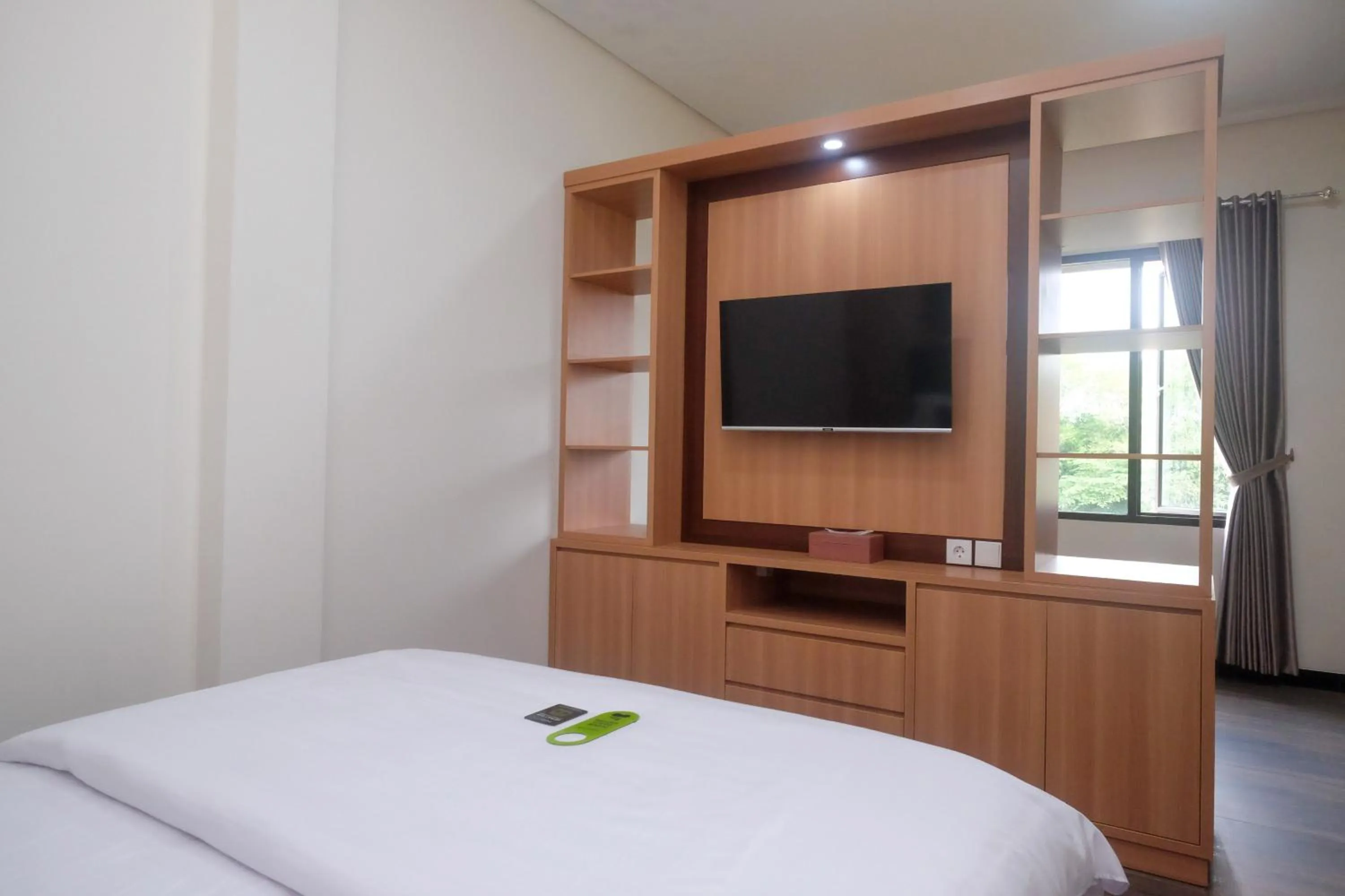 Bedroom, Bed in Urbanview Grand Lotus Hotel by RedDoorz