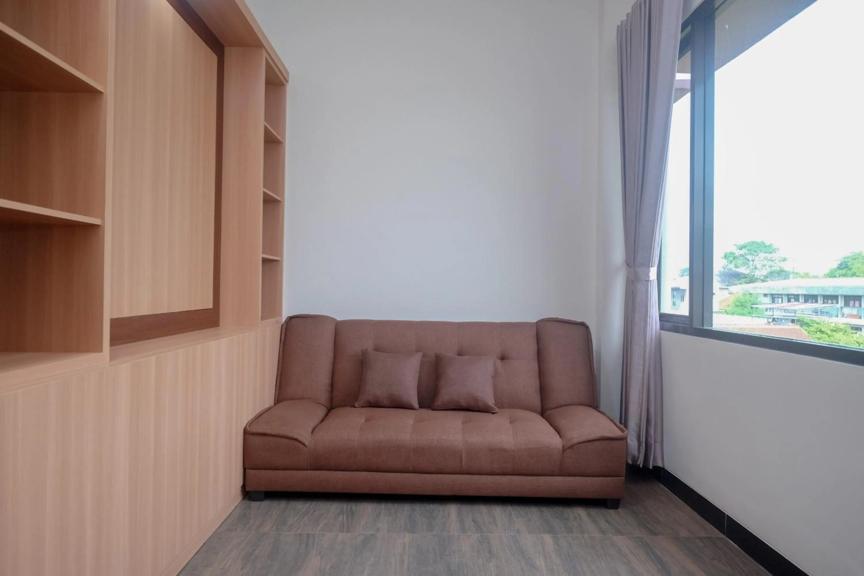 Seating area in Urbanview Grand Lotus Hotel by RedDoorz