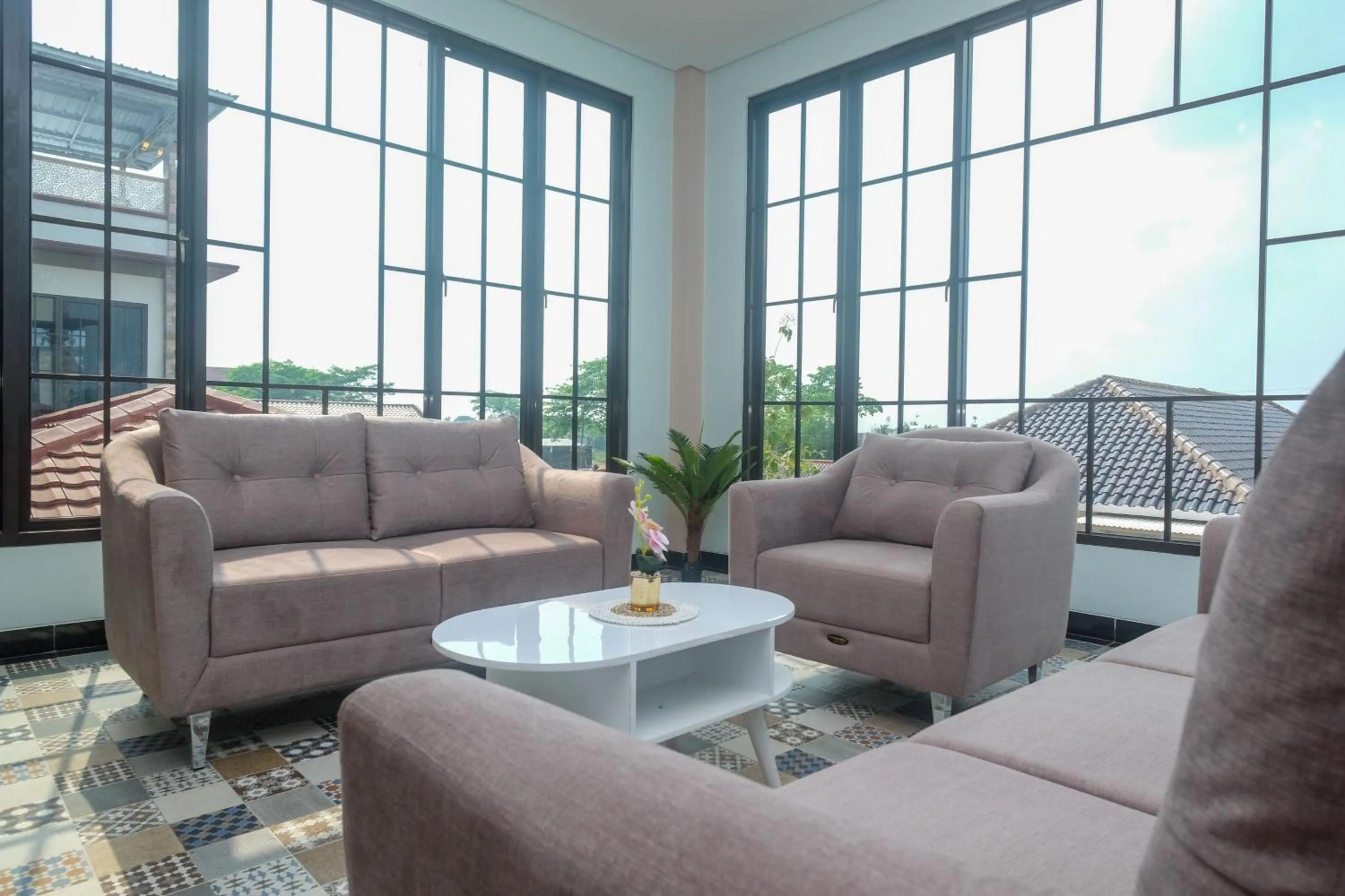 Seating area in Urbanview Grand Lotus Hotel by RedDoorz