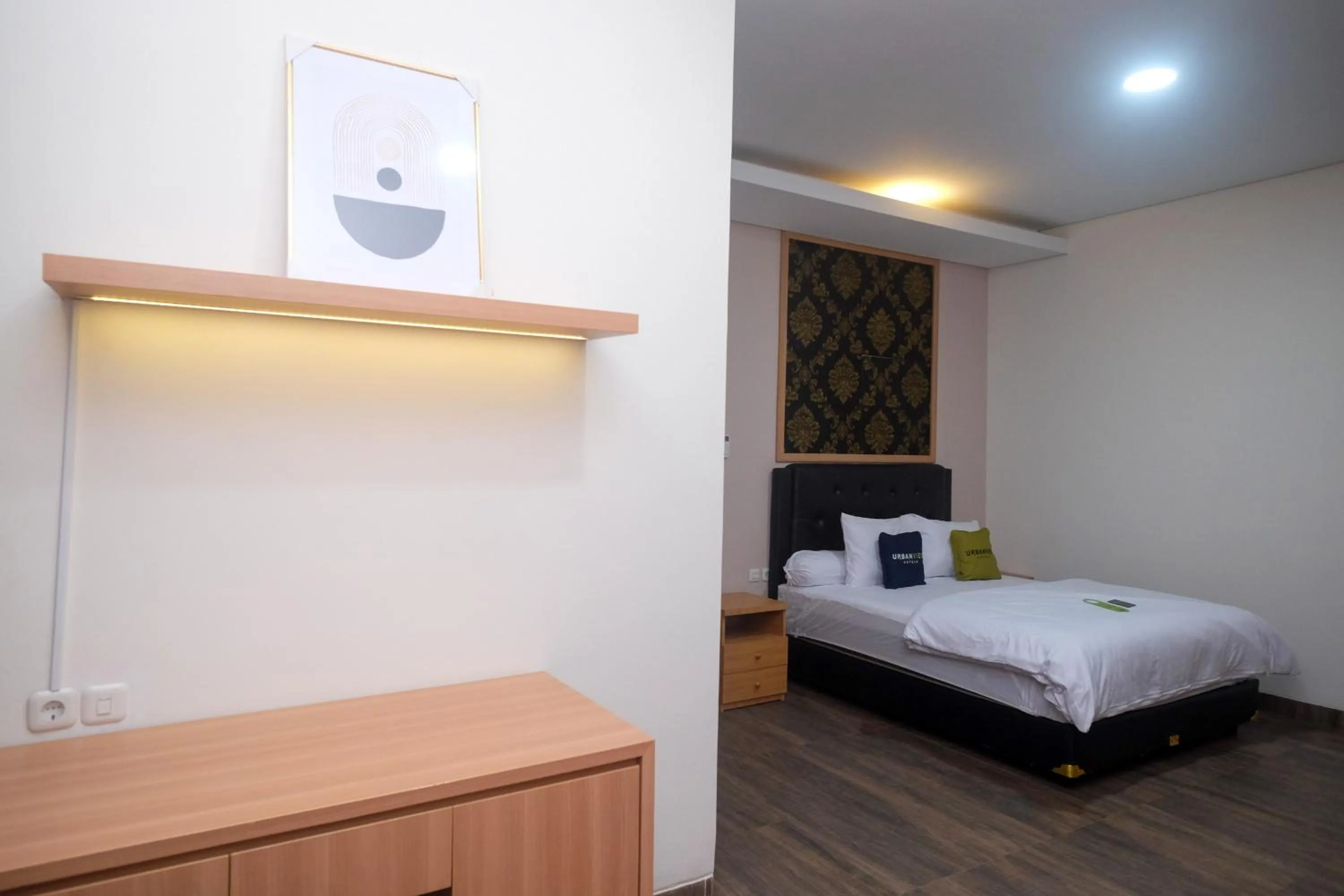 Bedroom, Bed in Urbanview Grand Lotus Hotel by RedDoorz