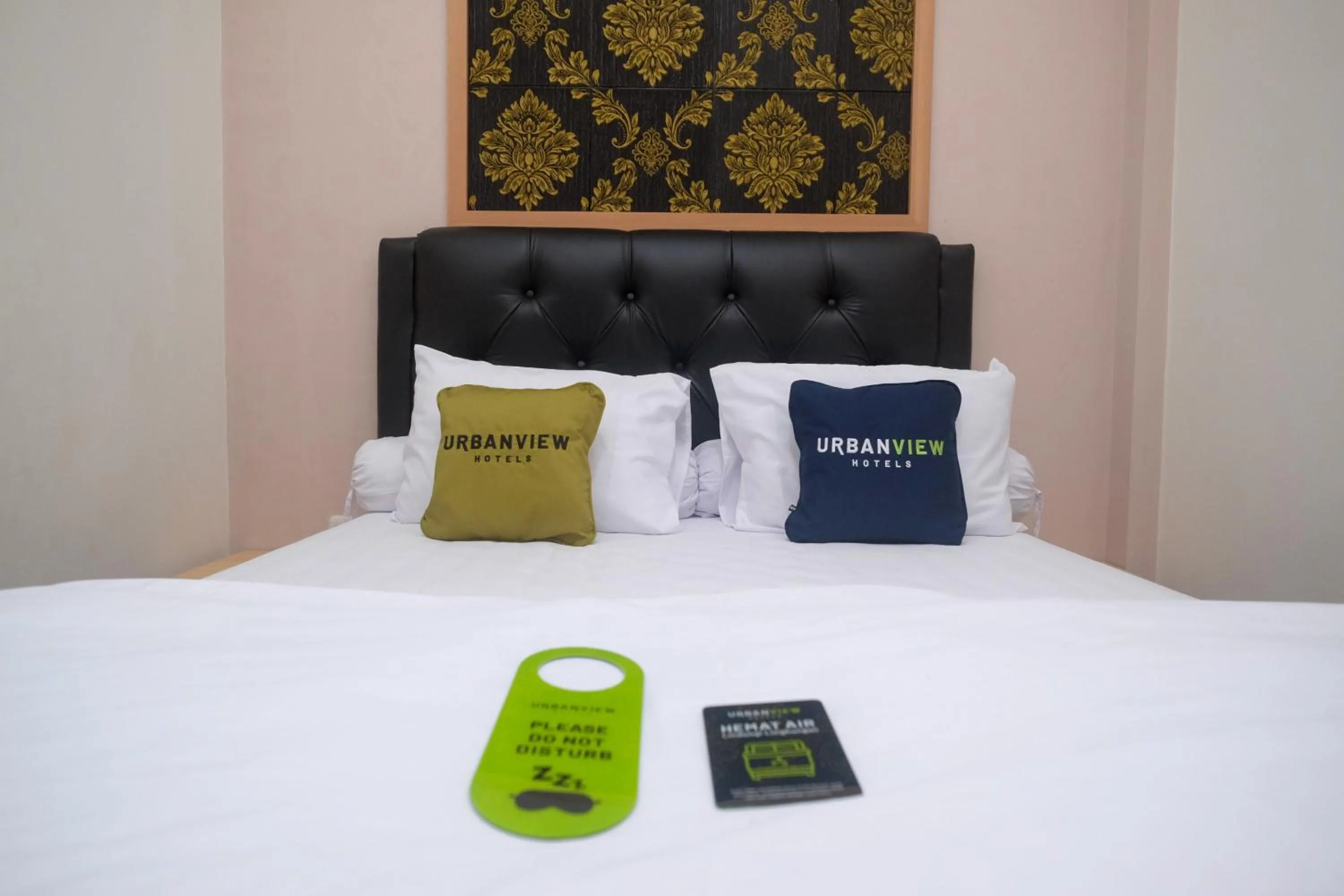 Bedroom, Bed in Urbanview Grand Lotus Hotel by RedDoorz