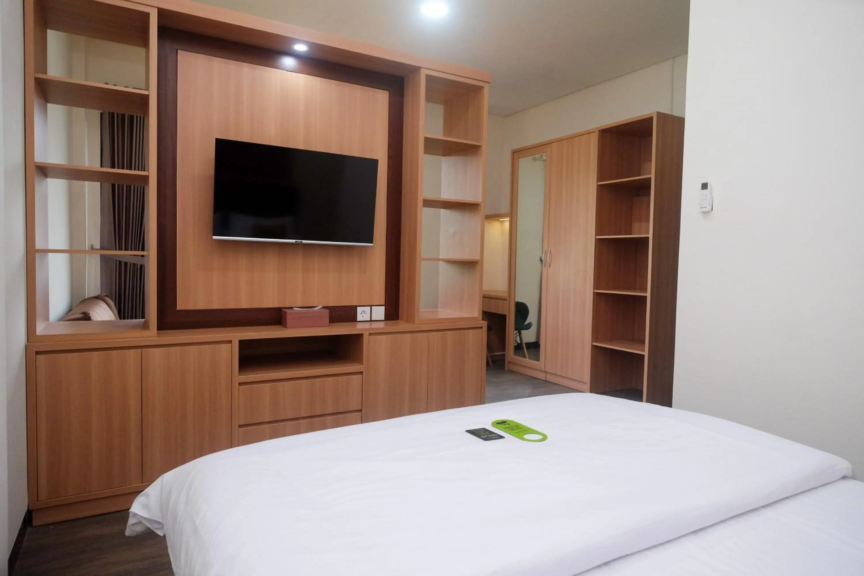 Bedroom, Bed in Urbanview Grand Lotus Hotel by RedDoorz