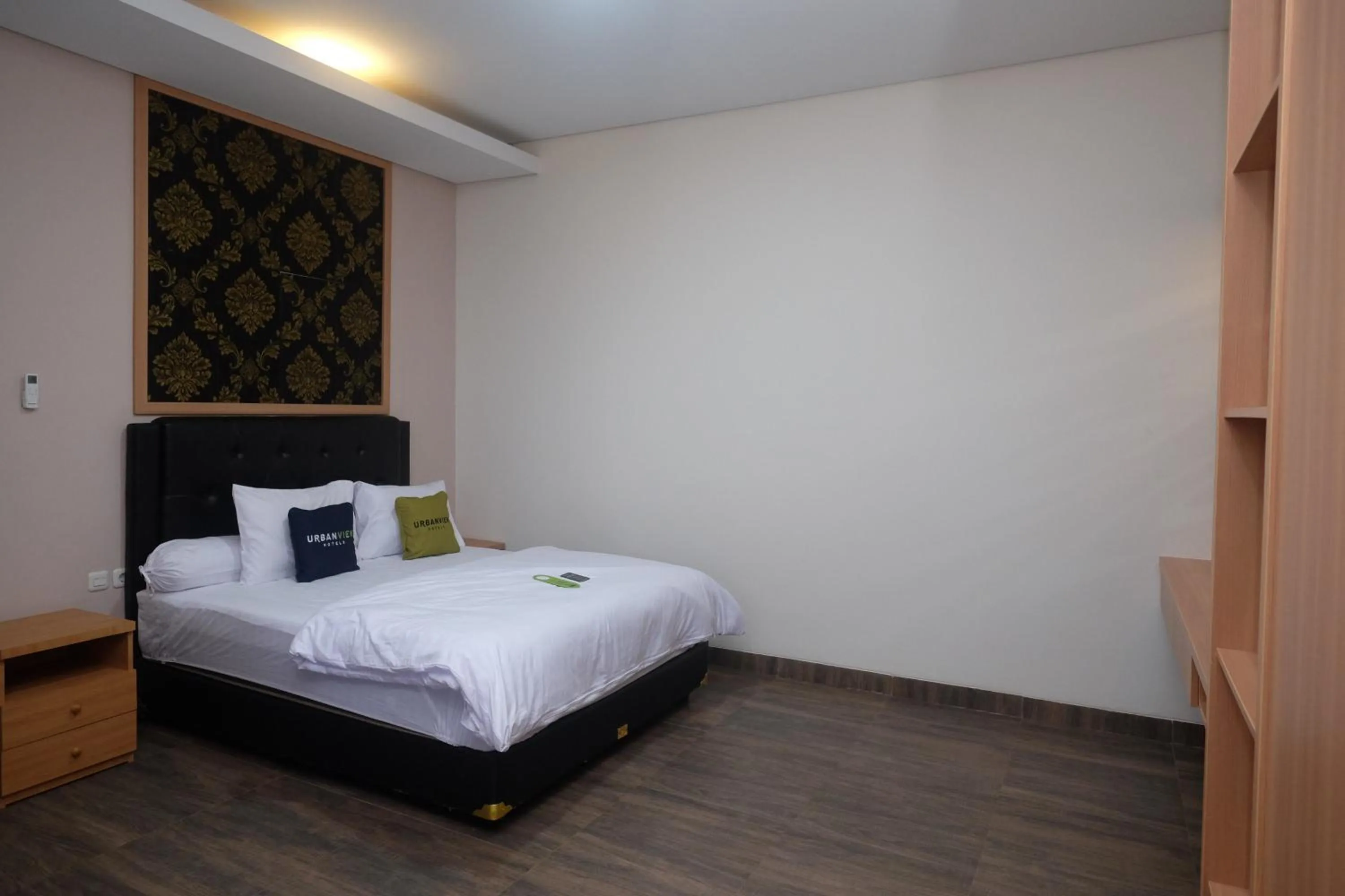 Bedroom, Bed in Urbanview Grand Lotus Hotel by RedDoorz