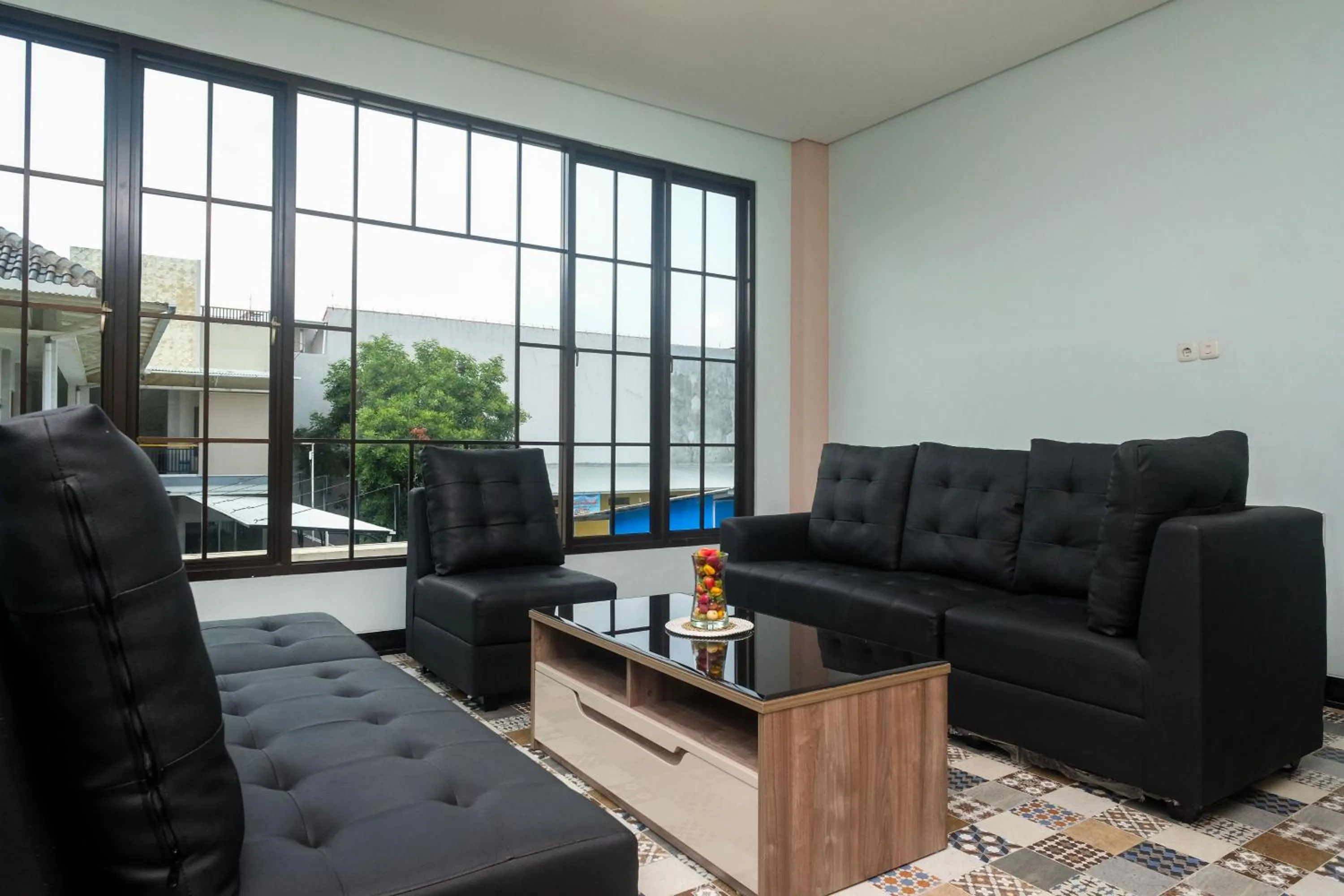 Seating area in Urbanview Grand Lotus Hotel by RedDoorz