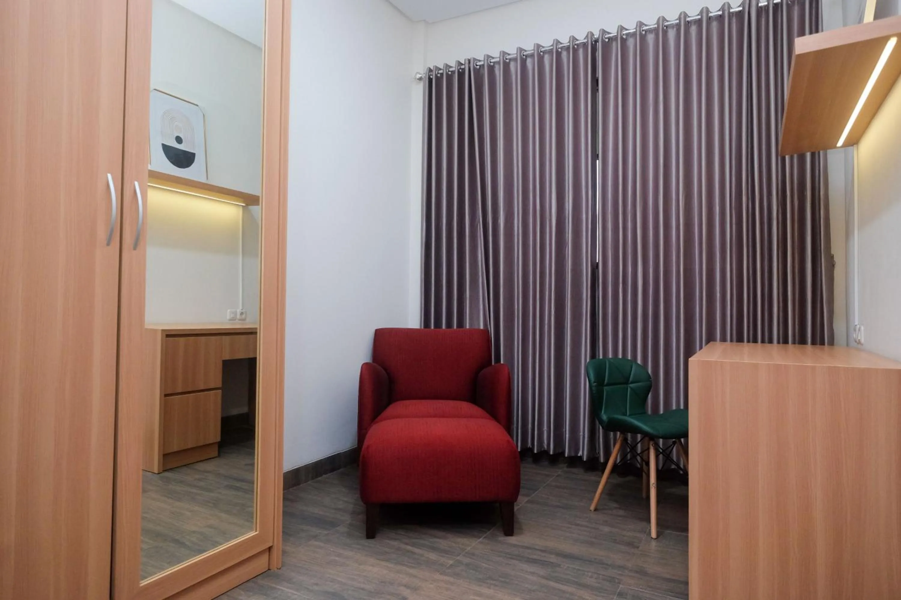 Seating area in Urbanview Grand Lotus Hotel by RedDoorz