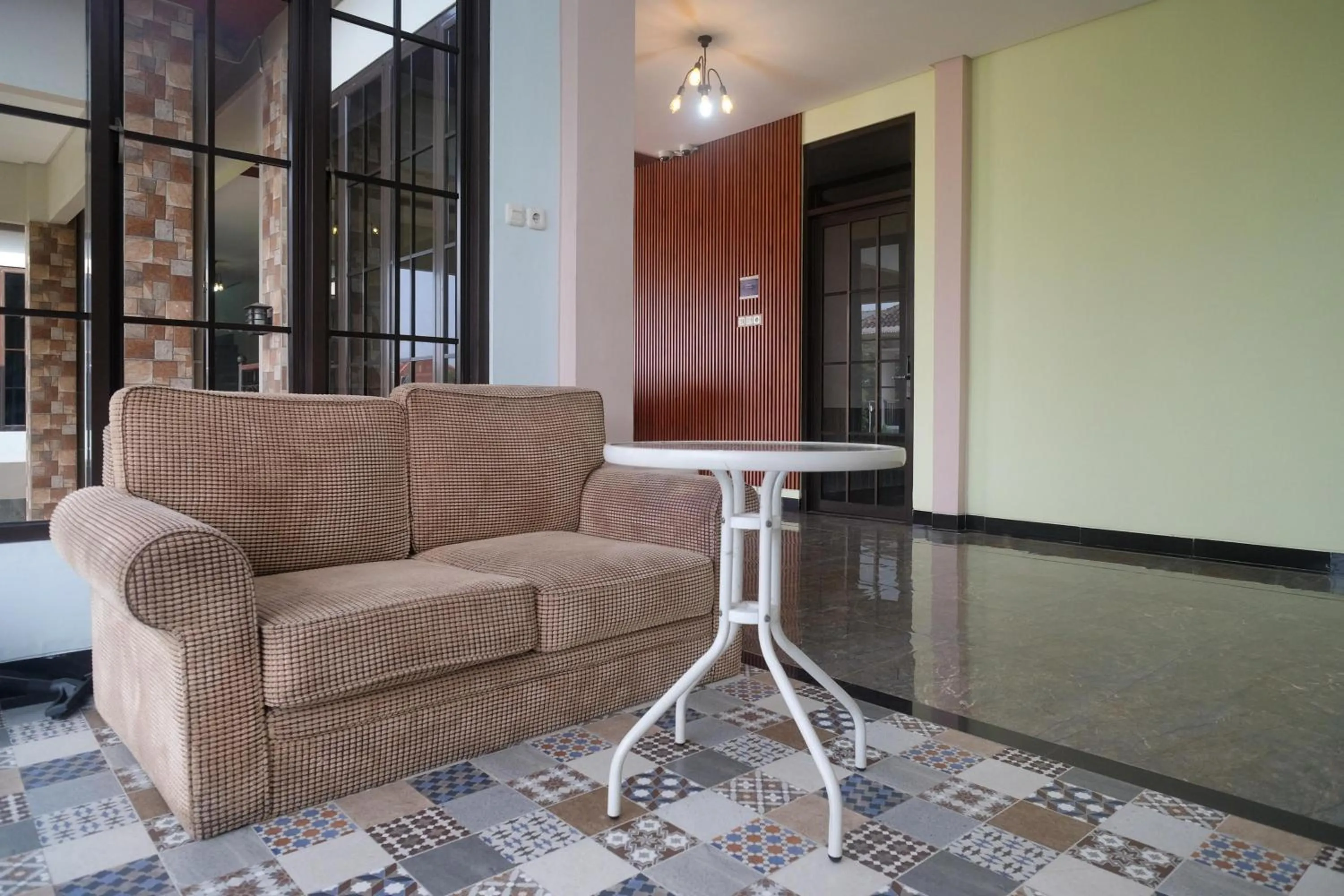 Seating area in Urbanview Grand Lotus Hotel by RedDoorz