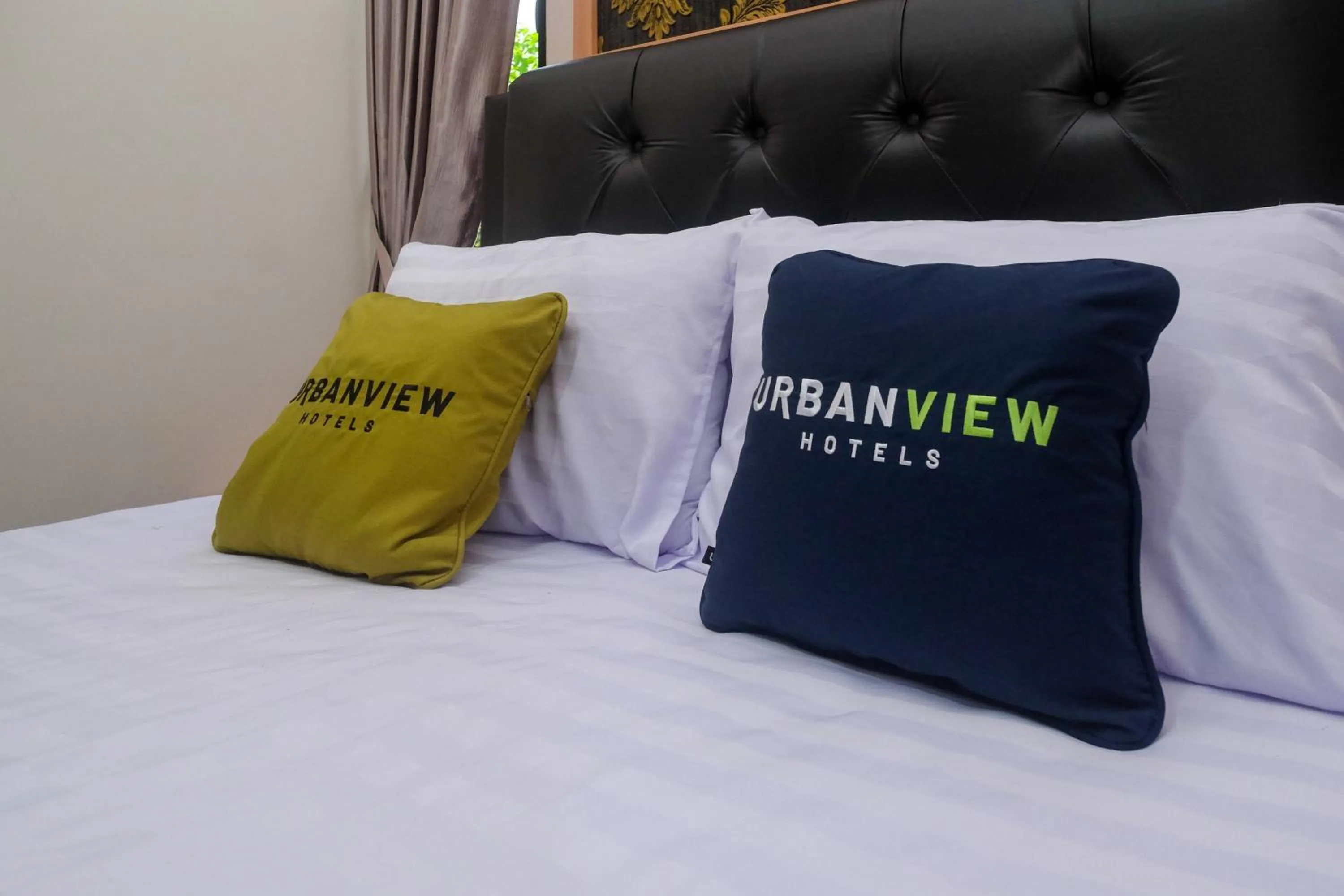 Bedroom, Bed in Urbanview Grand Lotus Hotel by RedDoorz