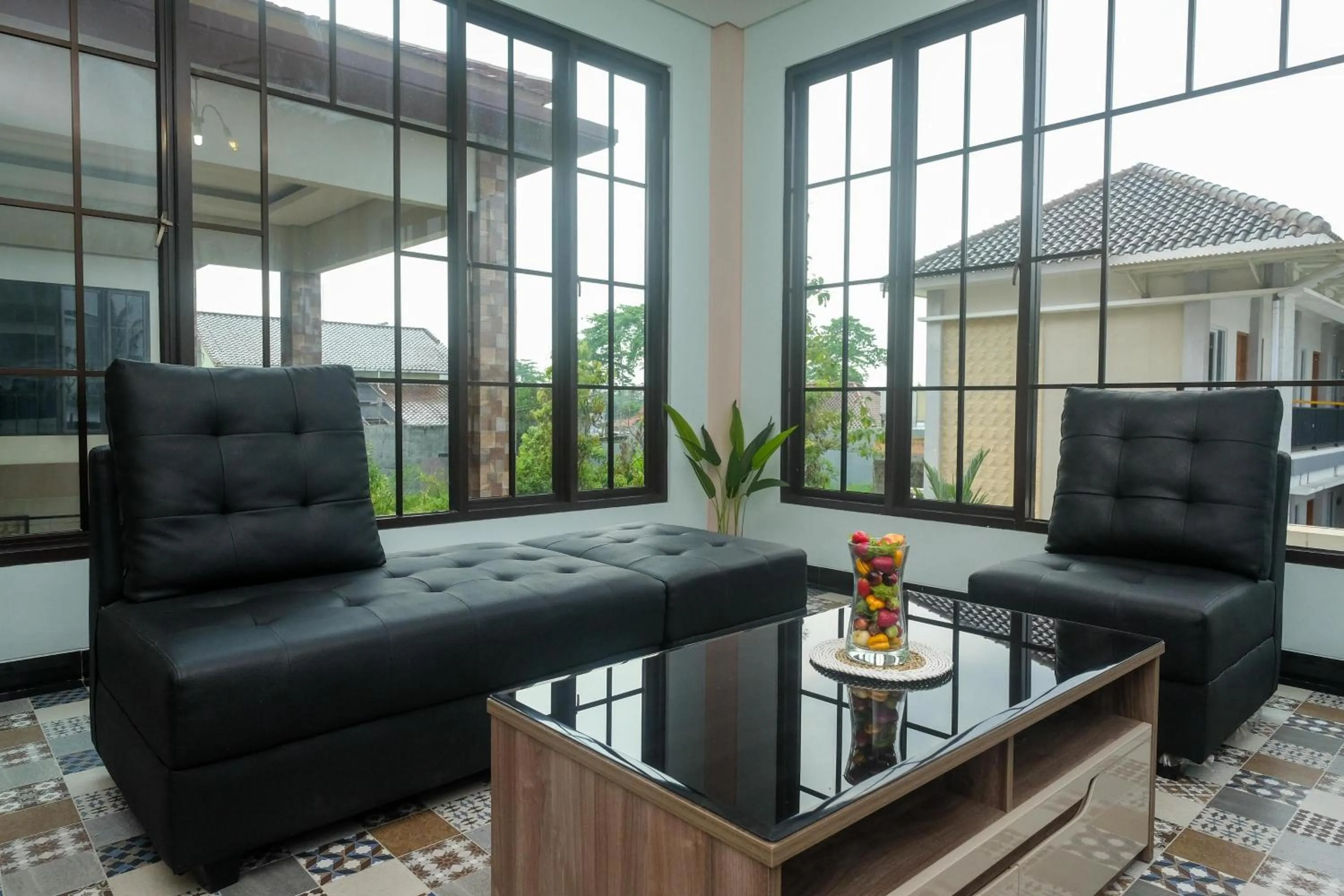 Seating area in Urbanview Grand Lotus Hotel by RedDoorz