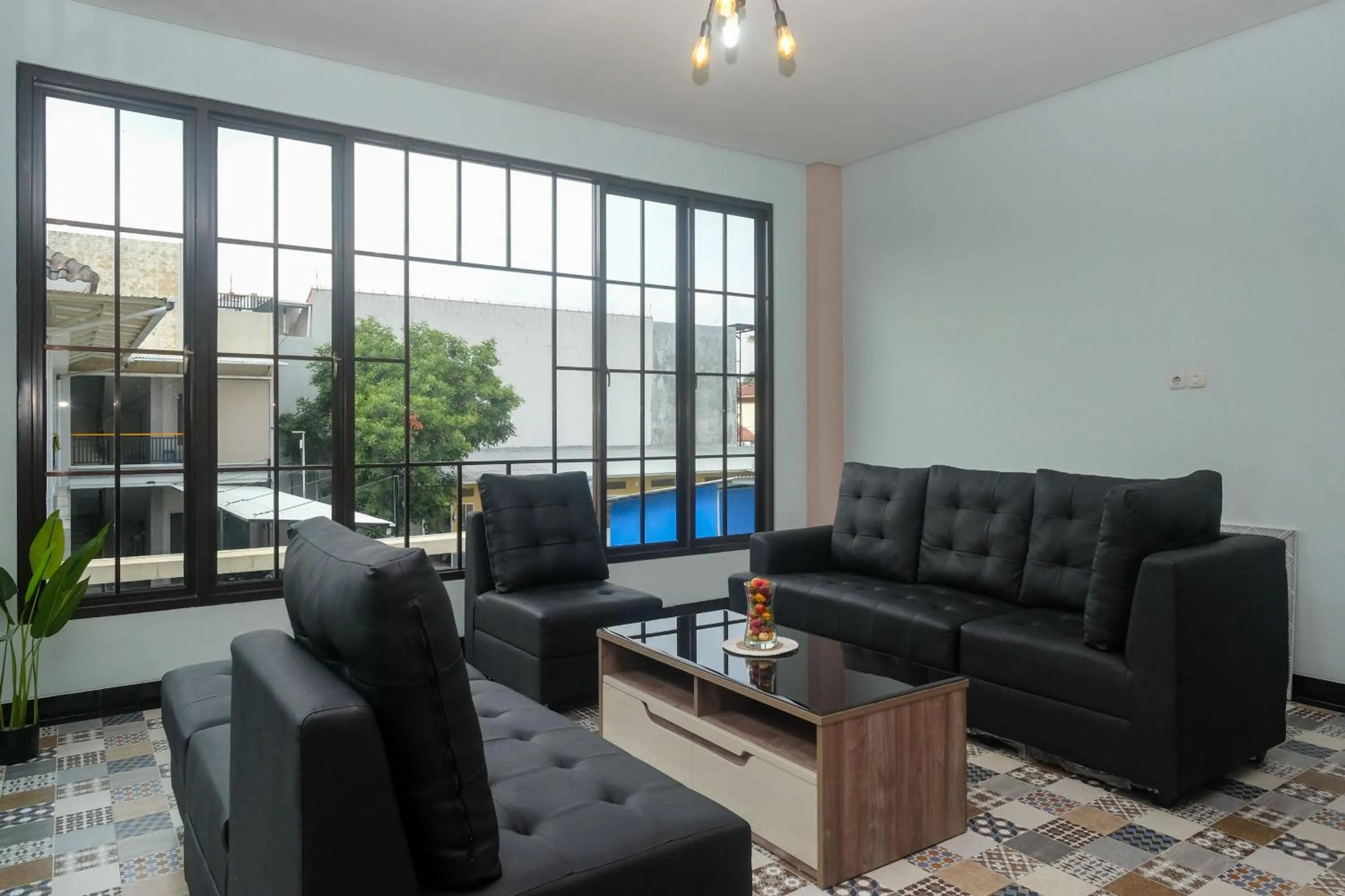 Seating area in Urbanview Grand Lotus Hotel by RedDoorz