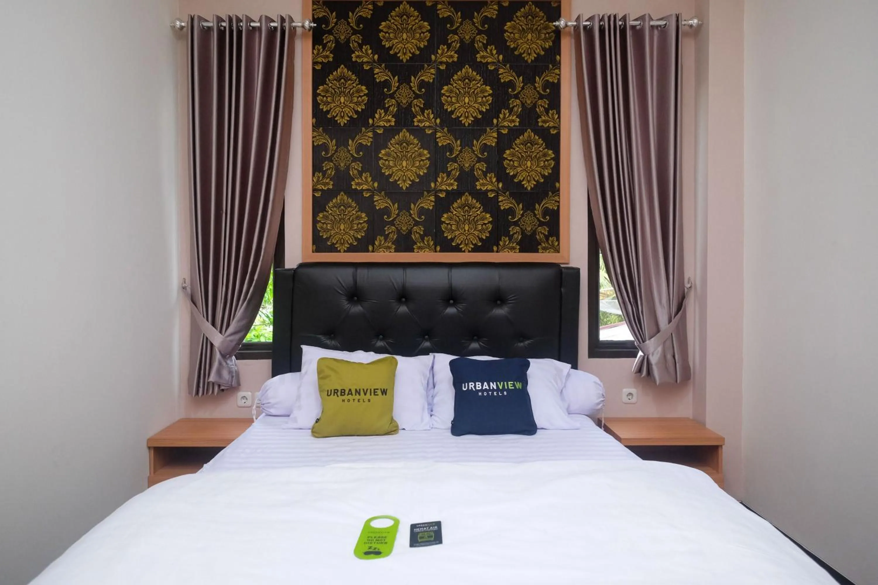 Bedroom, Bed in Urbanview Grand Lotus Hotel by RedDoorz