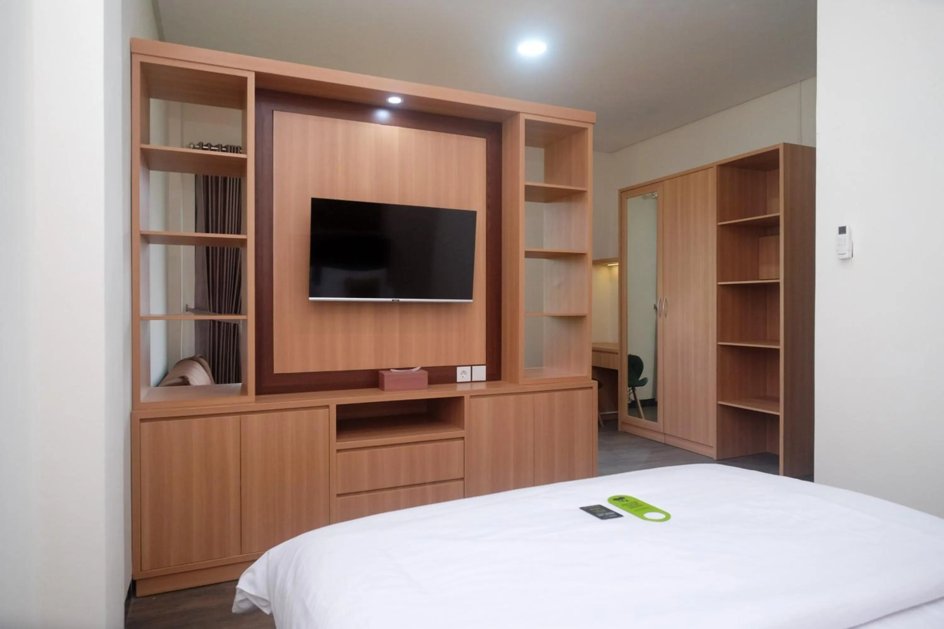 Bedroom, Bed in Urbanview Grand Lotus Hotel by RedDoorz