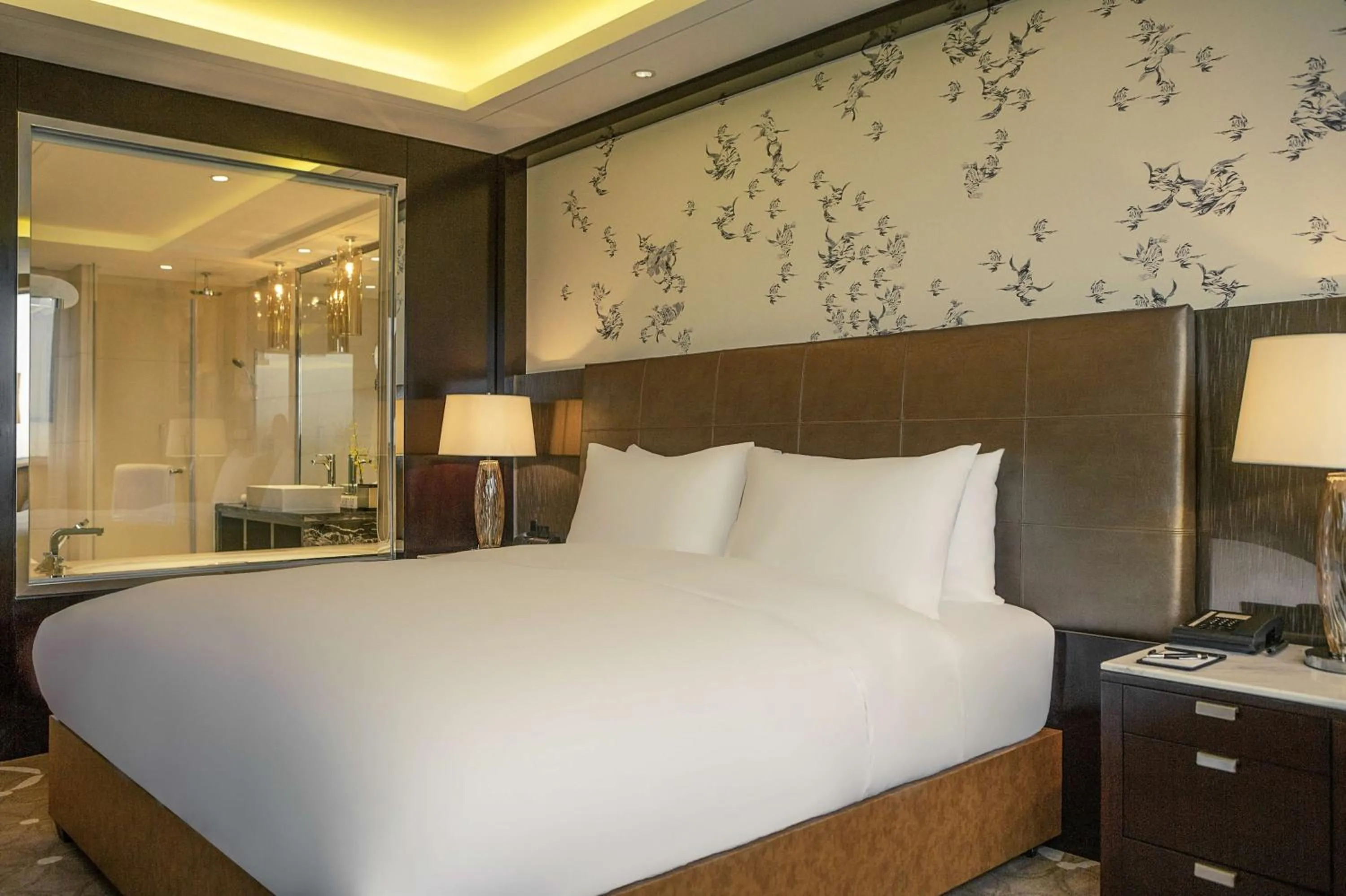 Bed in Grand Mercure Beijing Dongcheng Hotel