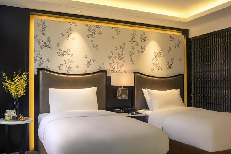Bed in Grand Mercure Beijing Dongcheng Hotel