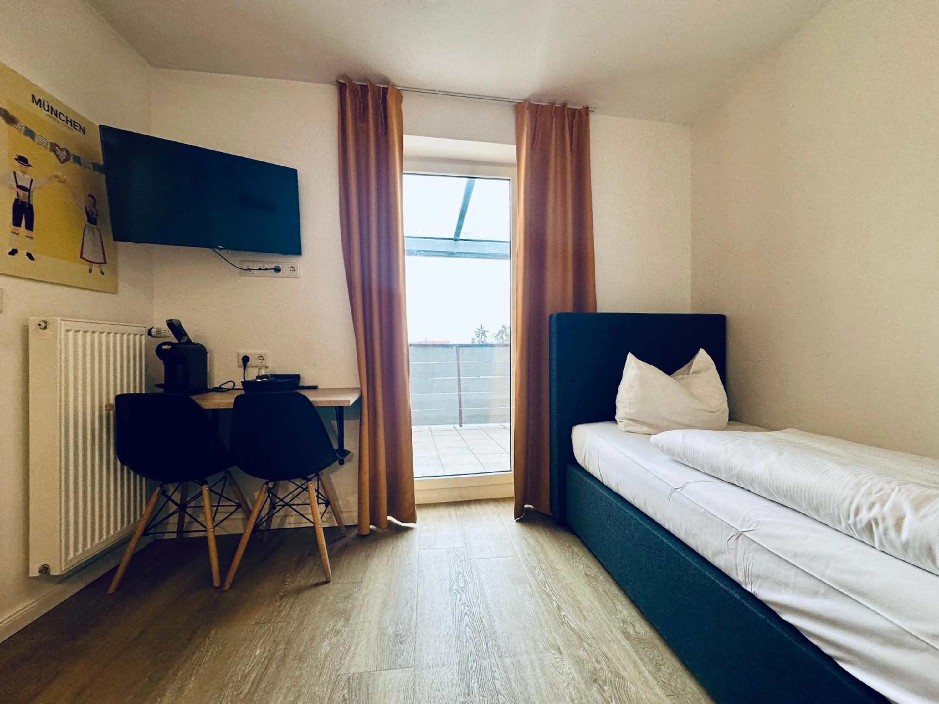 Bed in Homaris Apartments München Laim