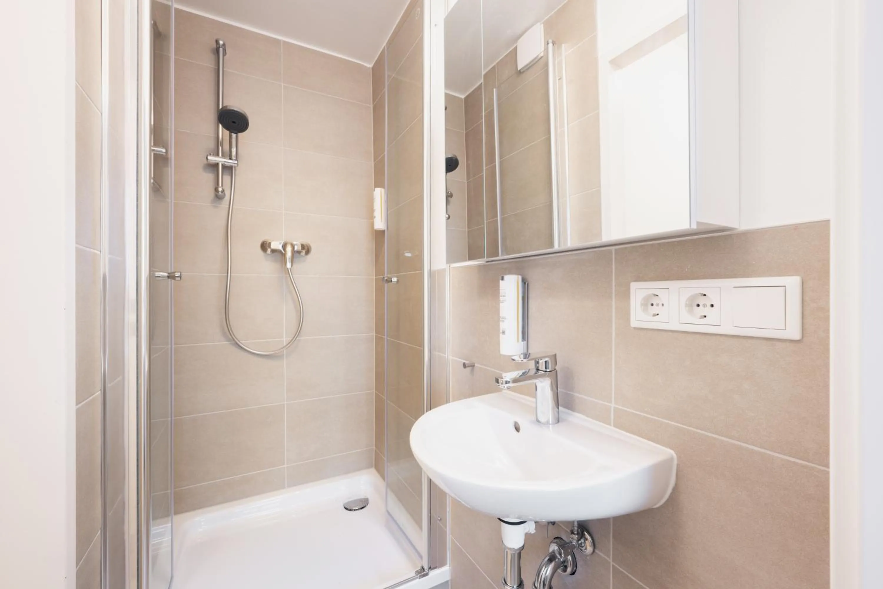 Shower in Homaris Apartments München Laim