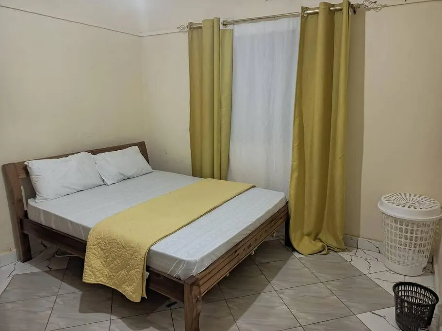 Bed in Tausa Tsavo Eco Lodge