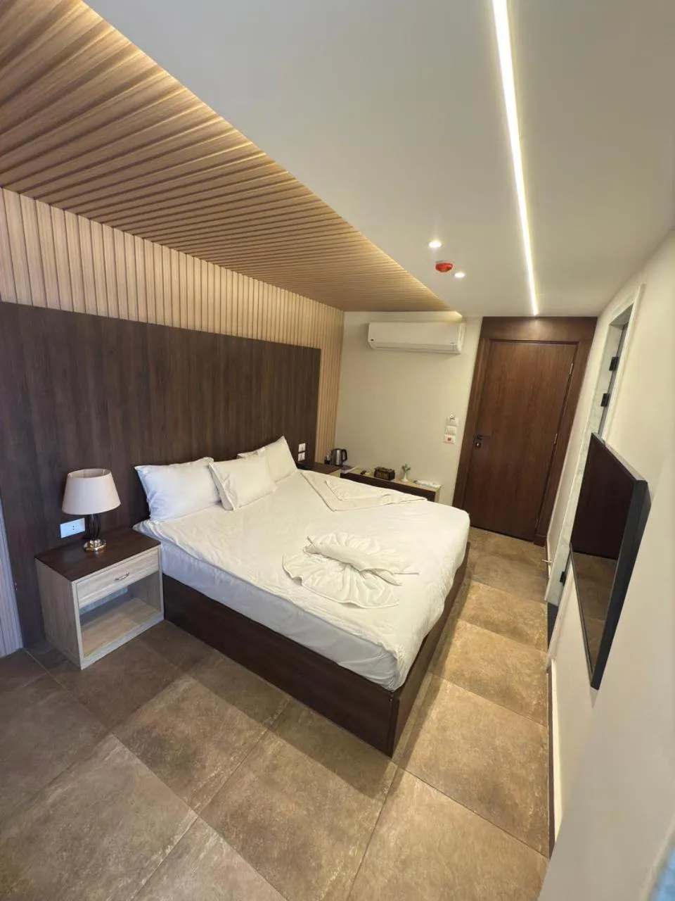 Bed in Blue Pyramids Eyes Hotel