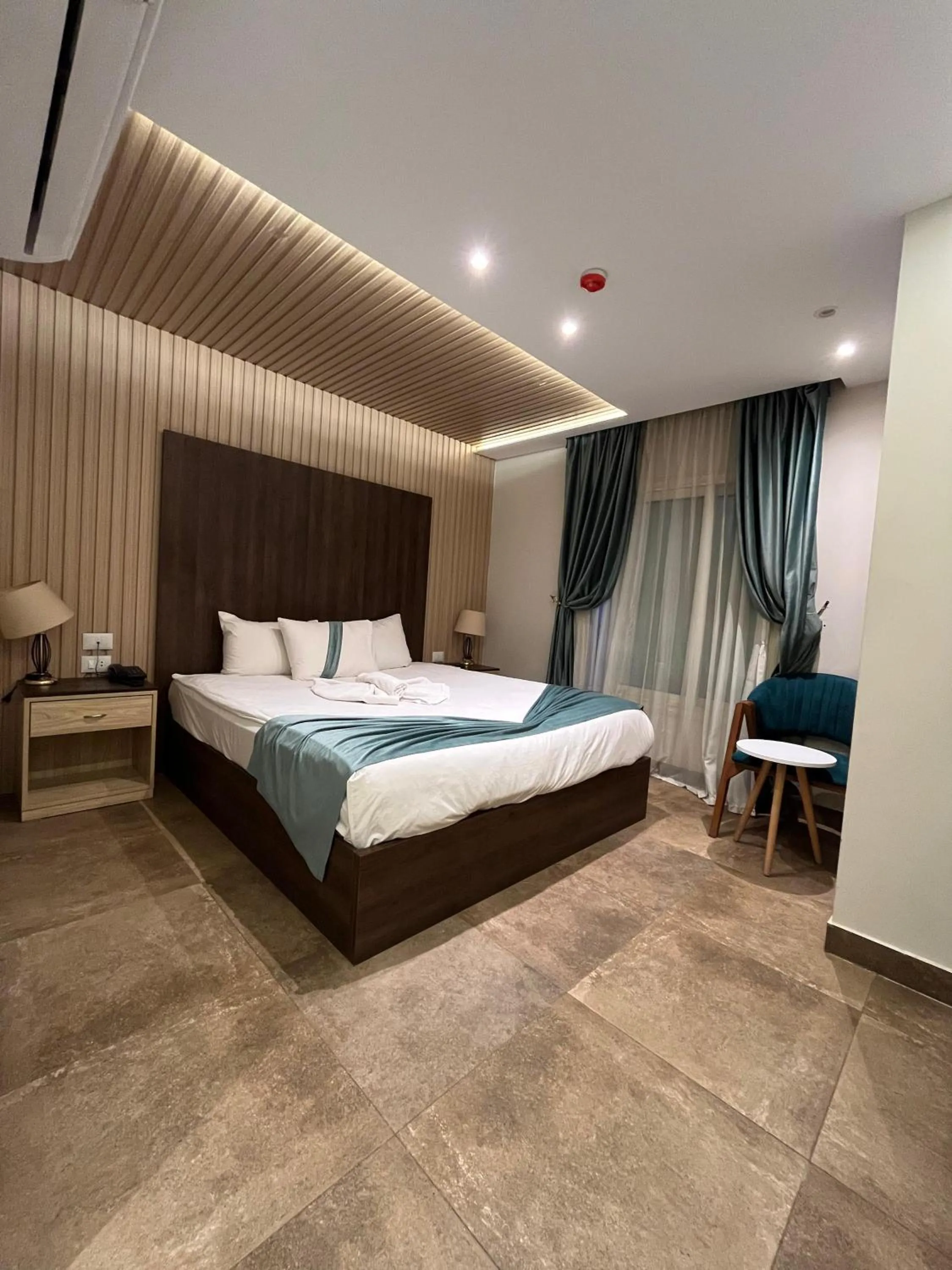 Bed in Blue Pyramids Eyes Hotel