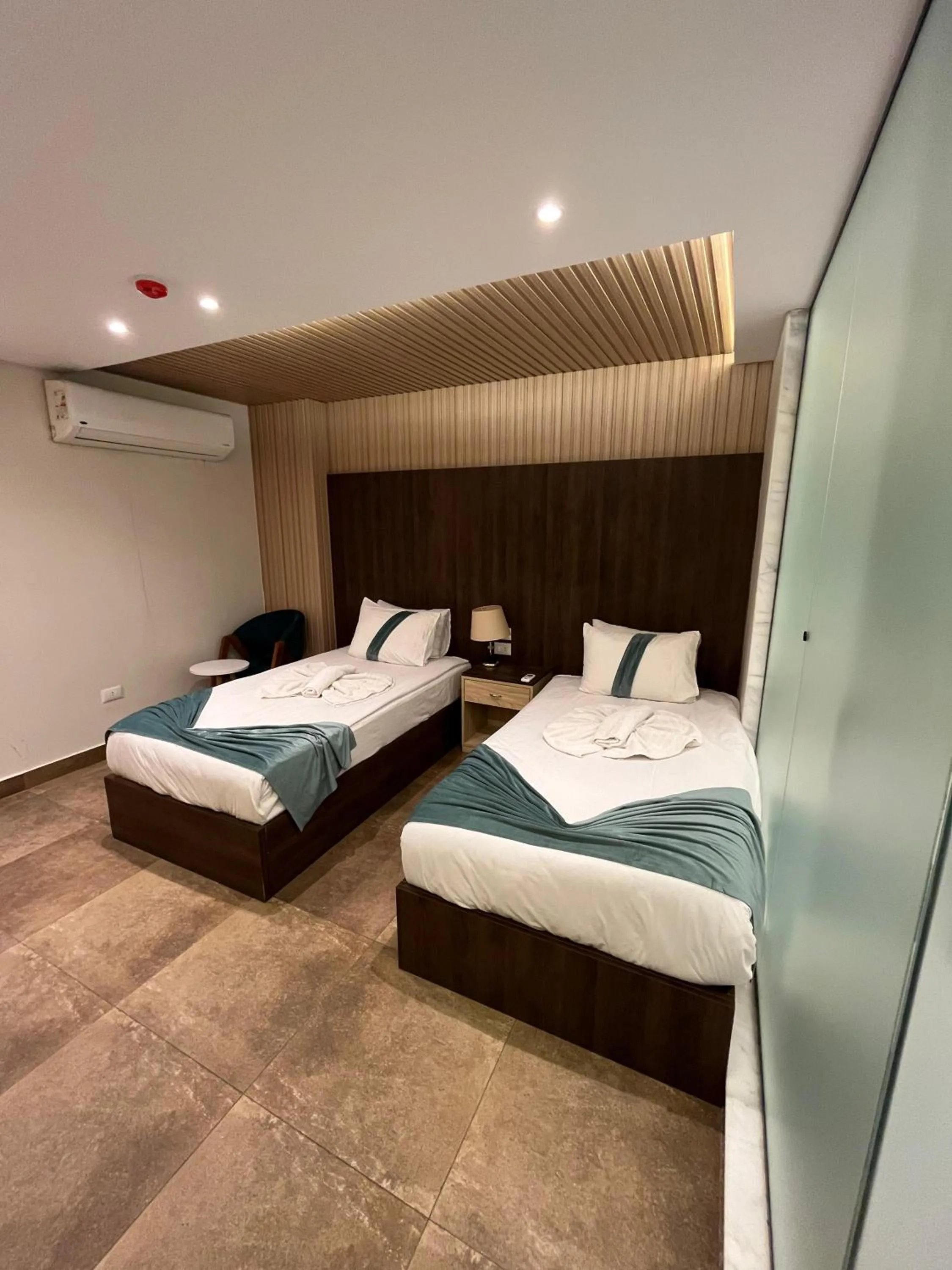 Bed in Blue Pyramids Eyes Hotel