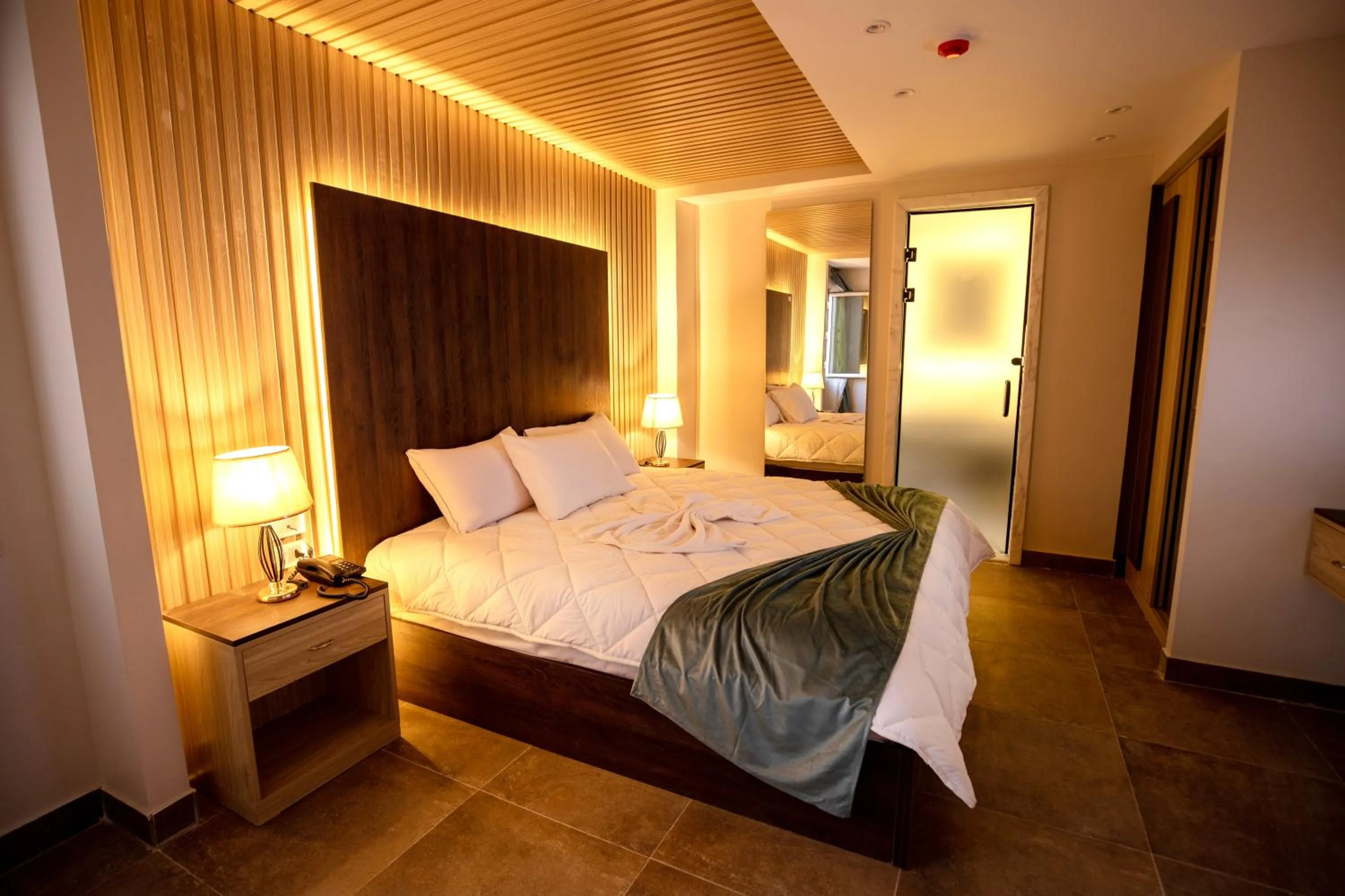 Bed in Blue Pyramids Eyes Hotel