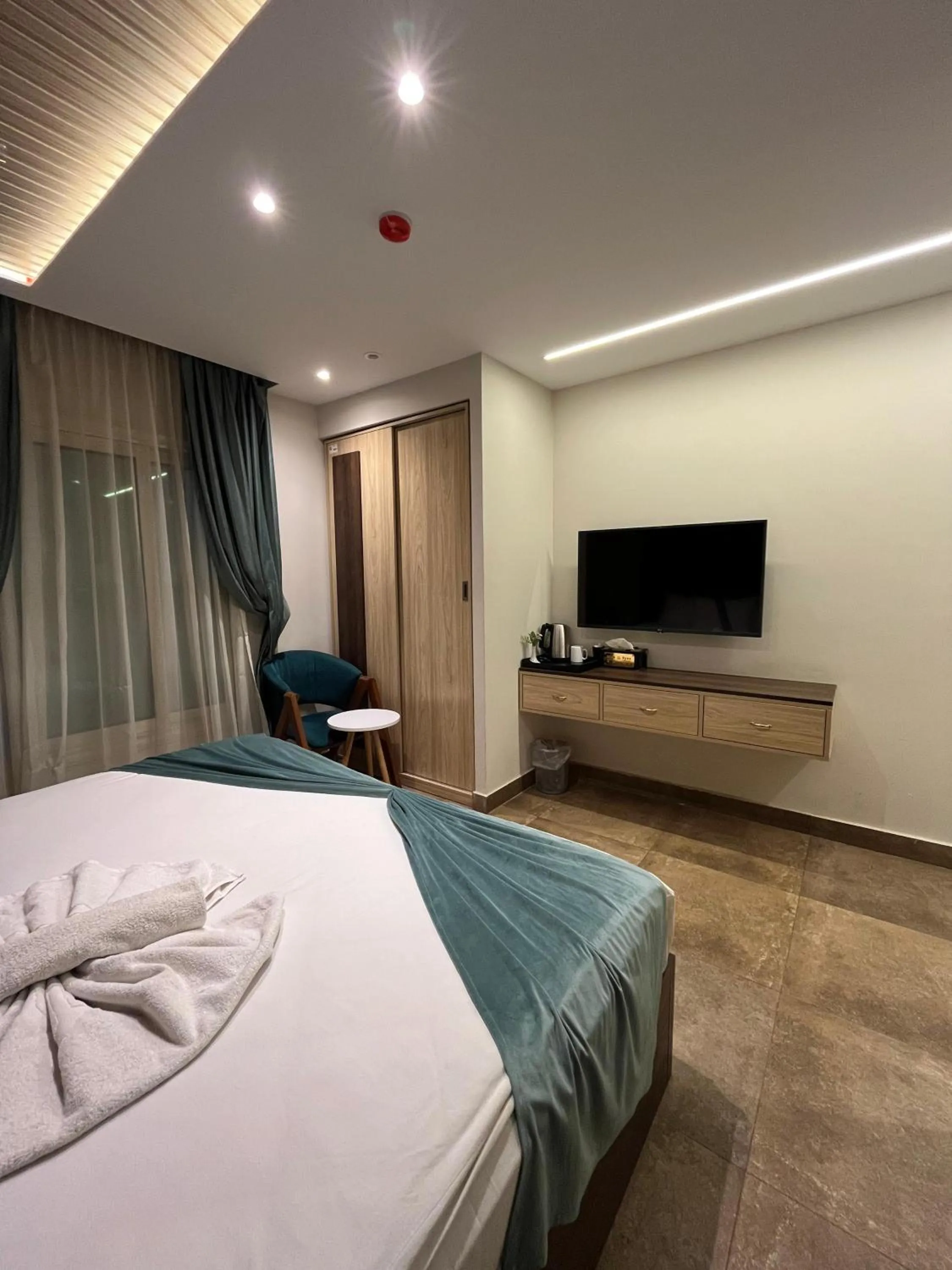 Bed in Blue Pyramids Eyes Hotel