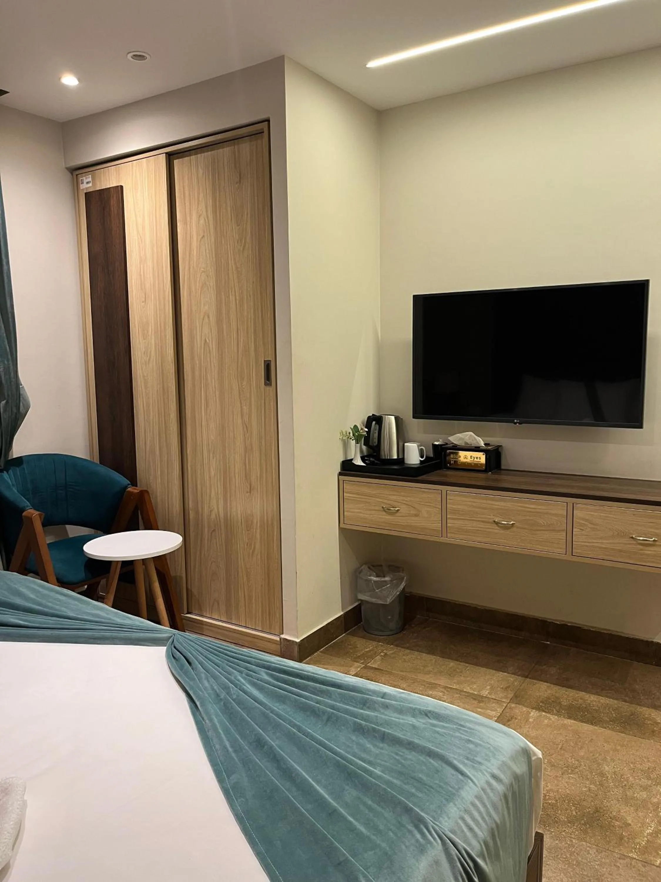 Bed in Blue Pyramids Eyes Hotel