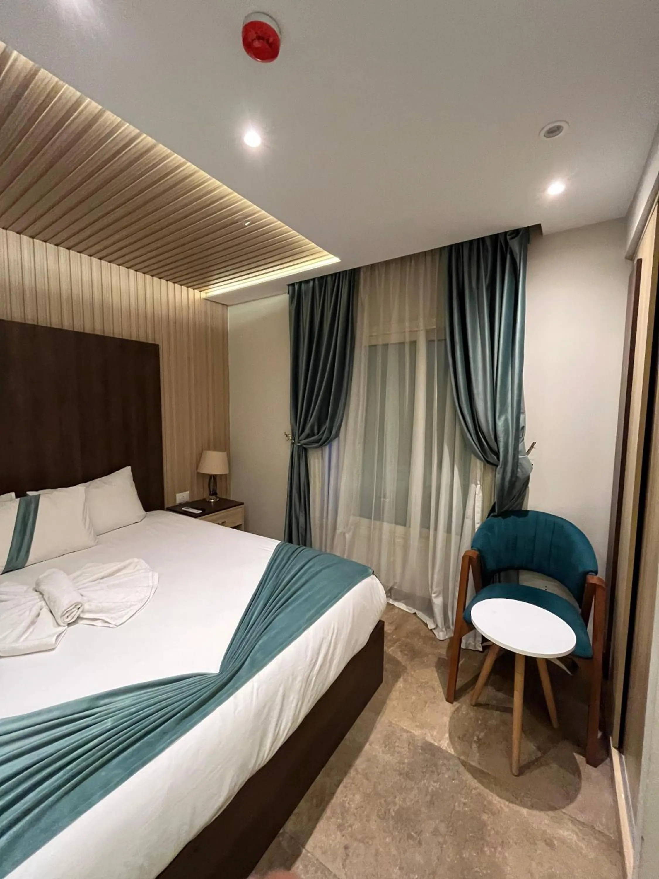 Bed in Blue Pyramids Eyes Hotel