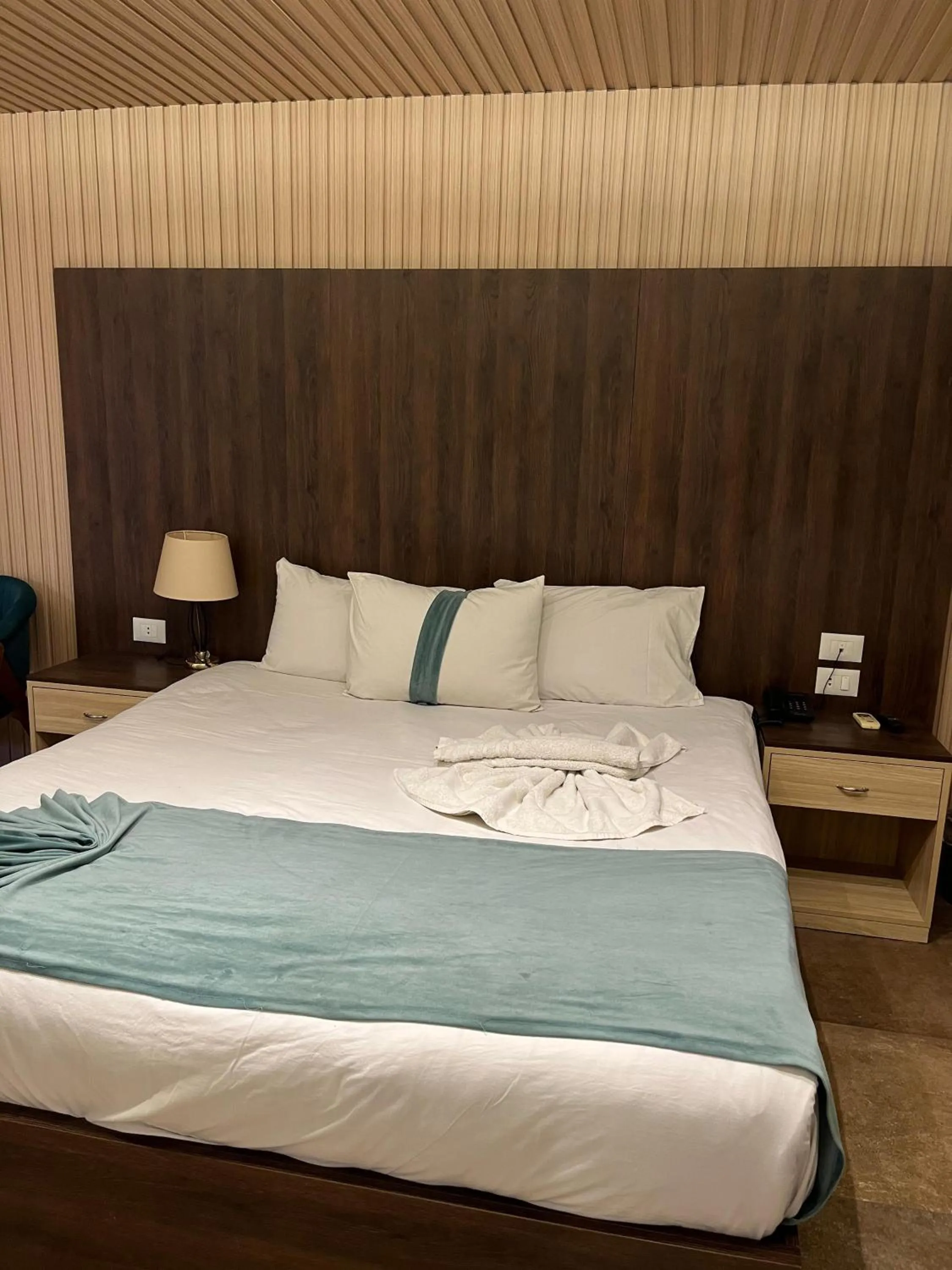 Bed in Blue Pyramids Eyes Hotel