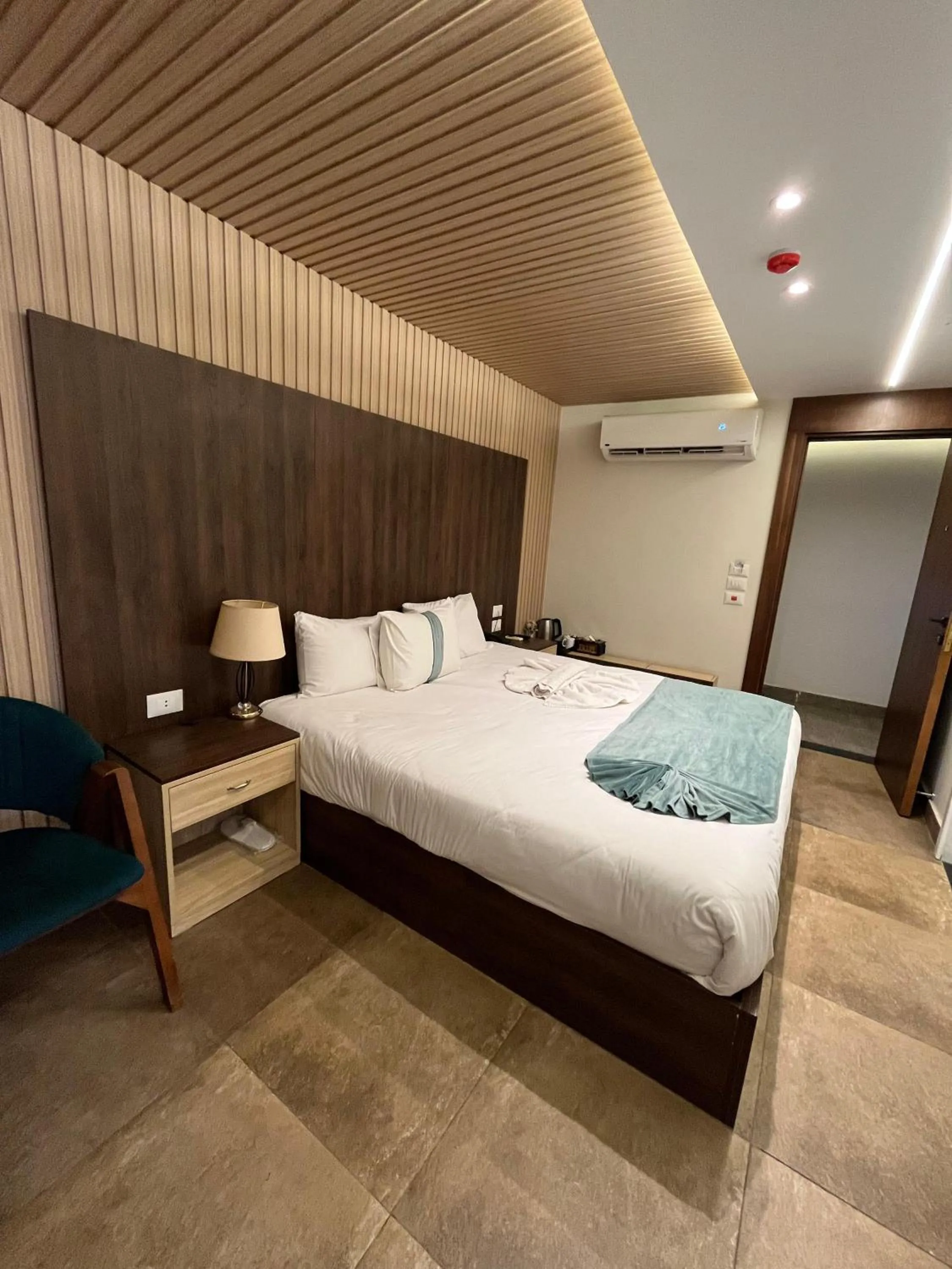 Bed in Blue Pyramids Eyes Hotel