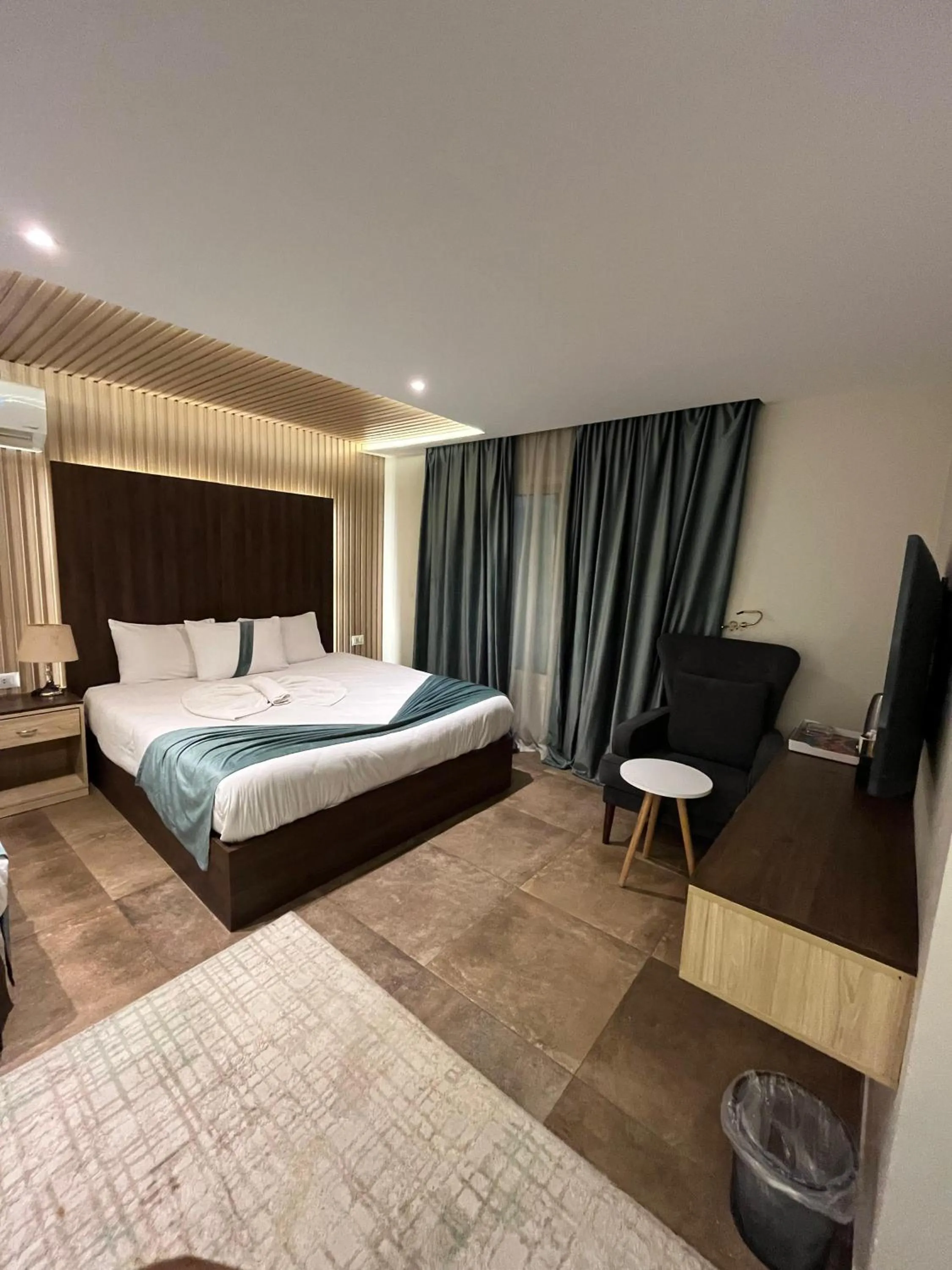 Bed in Blue Pyramids Eyes Hotel