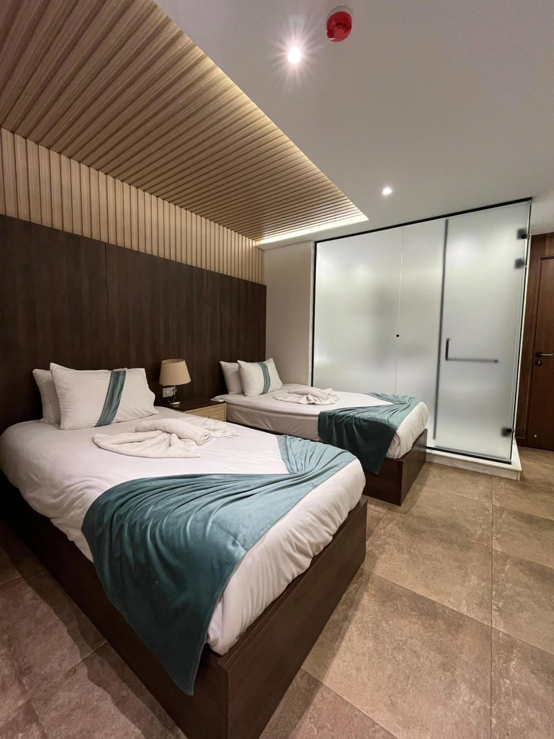 Bed in Blue Pyramids Eyes Hotel