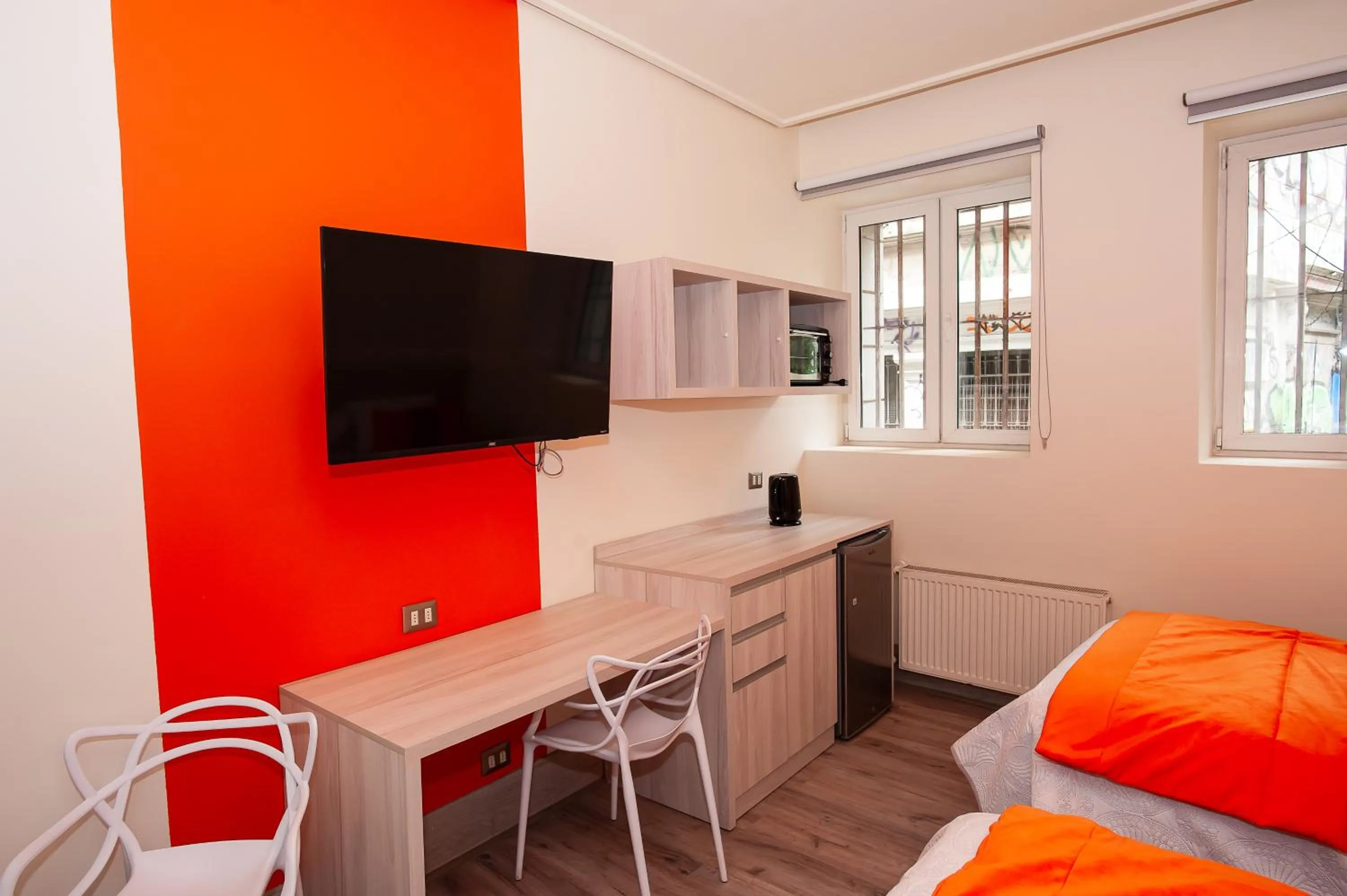 Communal lounge/ TV room, Bed in Casa Esmeralda