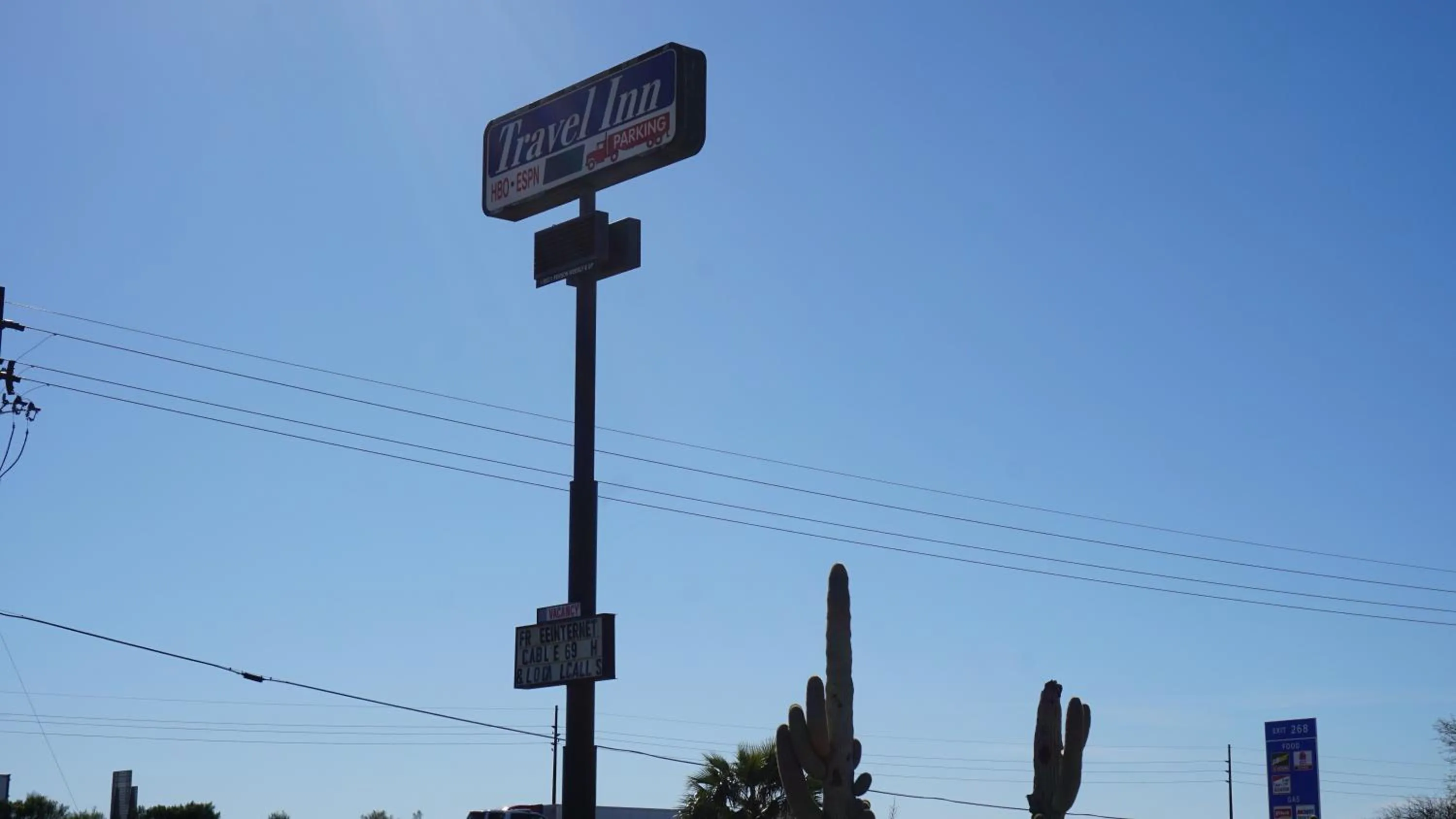 Property logo or sign in Travel Inn Tucson