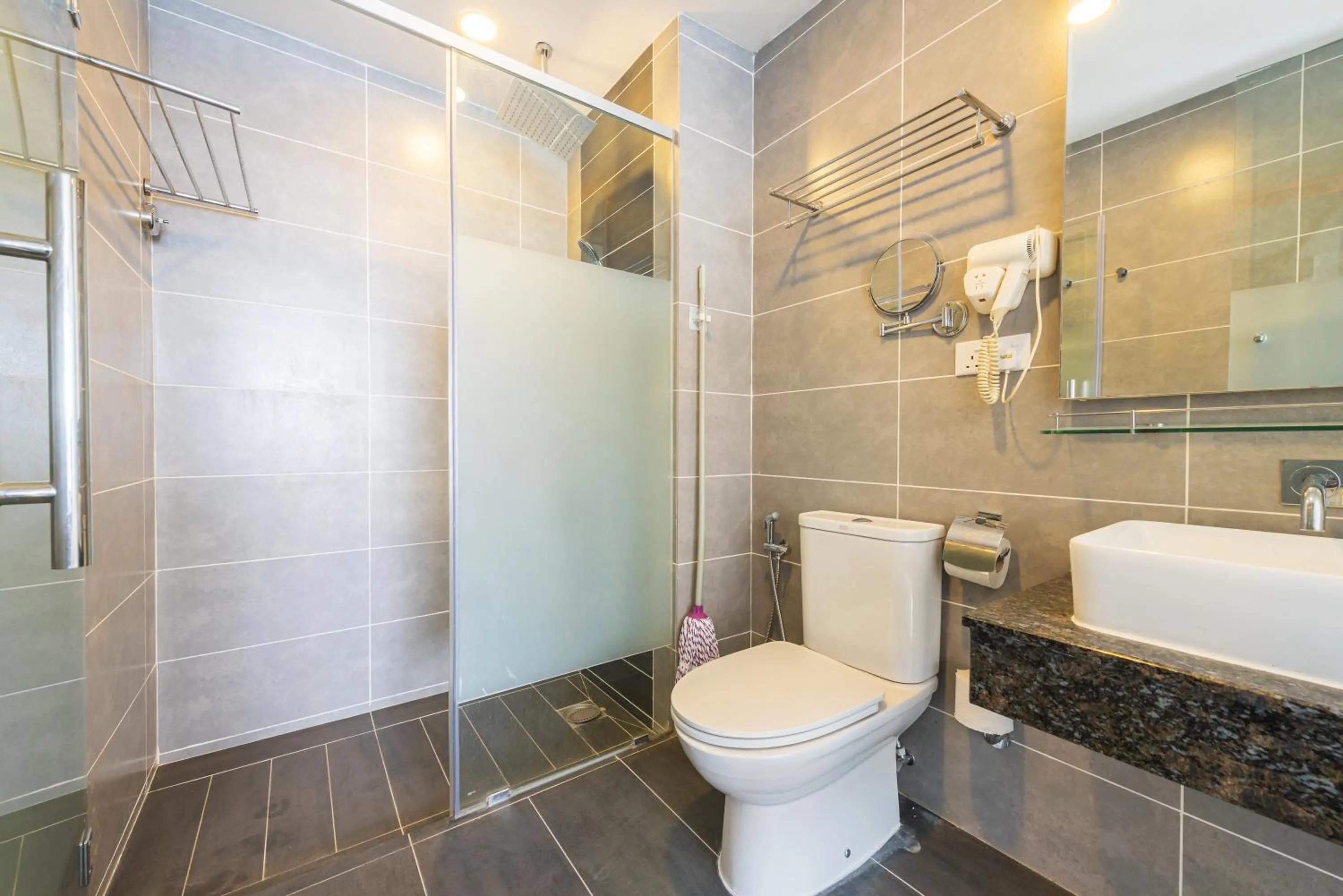 Bathroom in GENTING FoggyCold StayCation AT Ion Delemen By HAPYHOME