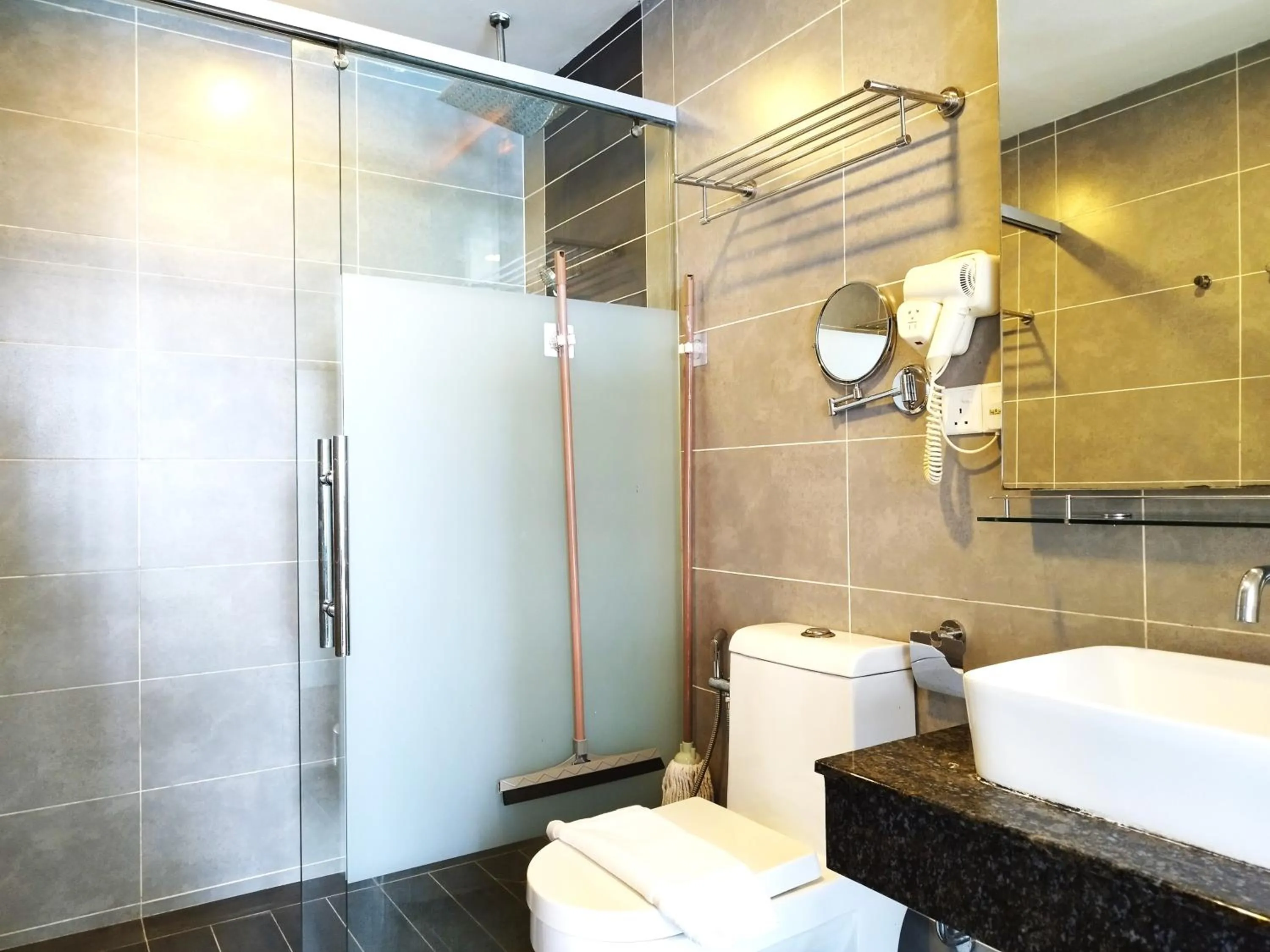 Bathroom in GENTING FoggyCold StayCation AT Ion Delemen By HAPYHOME