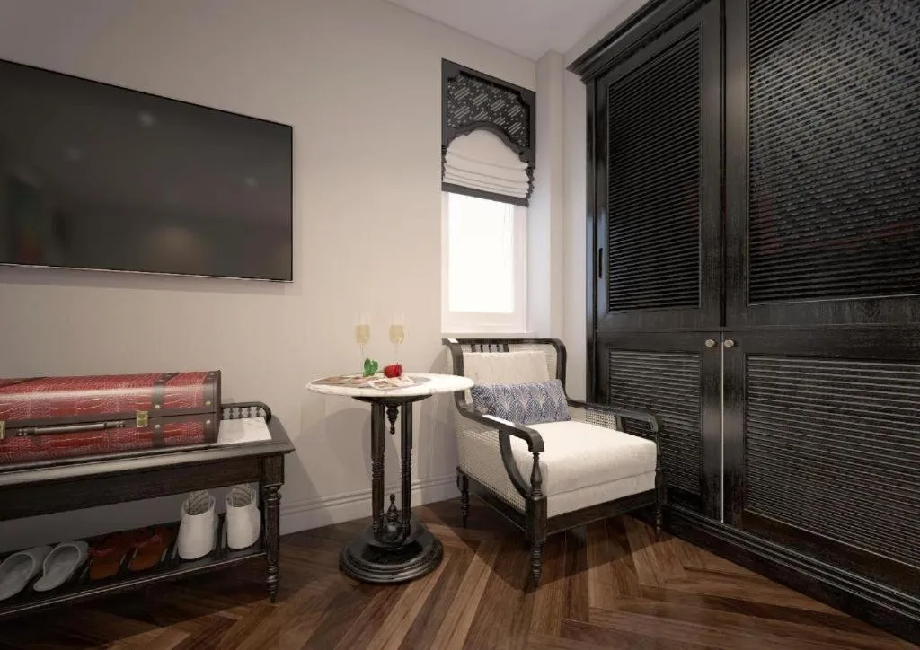 Seating area, Bed in Hanoi Graceful Hotel and Travel