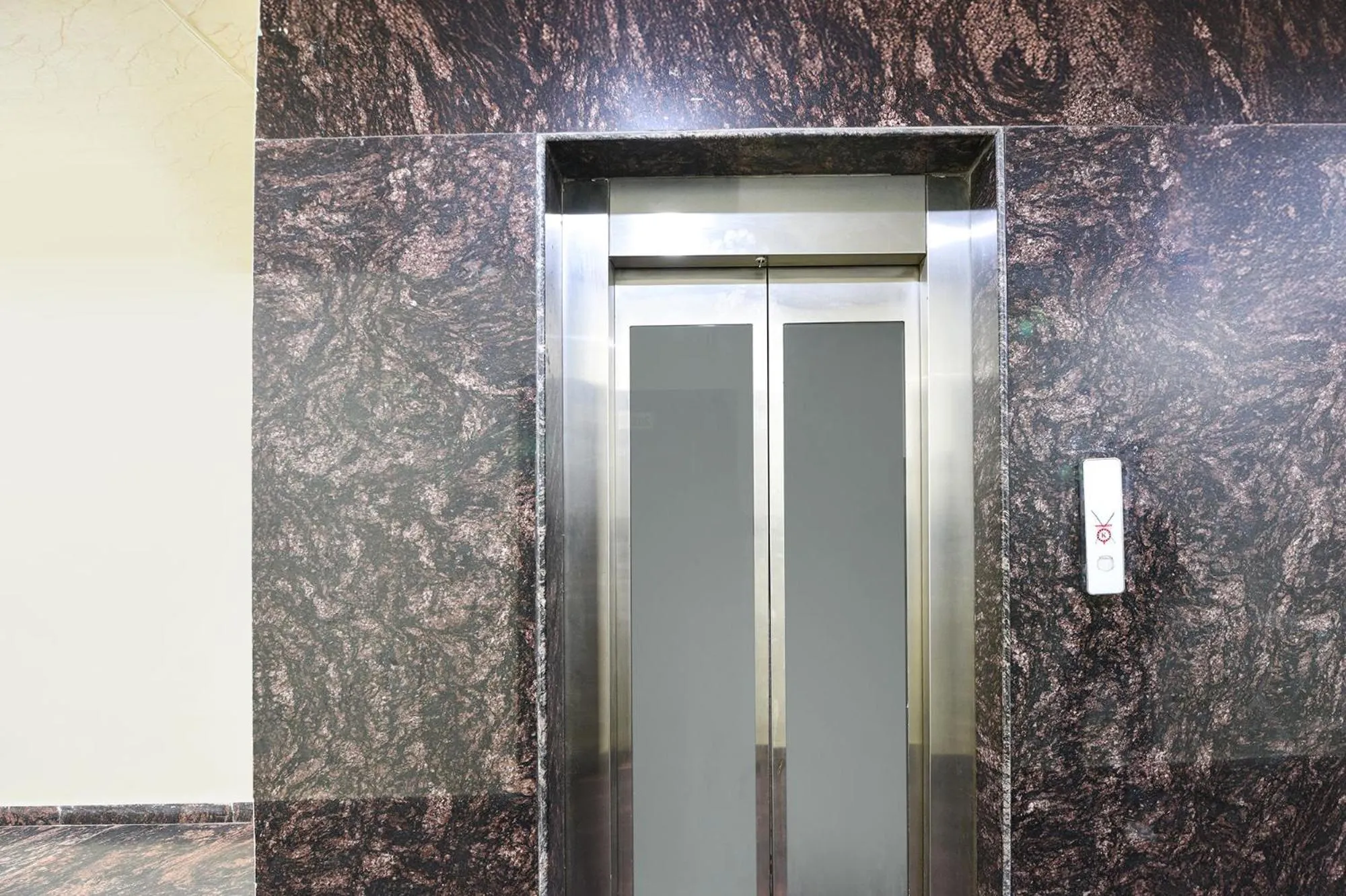 elevator in FabHotel Royal Reena Residency