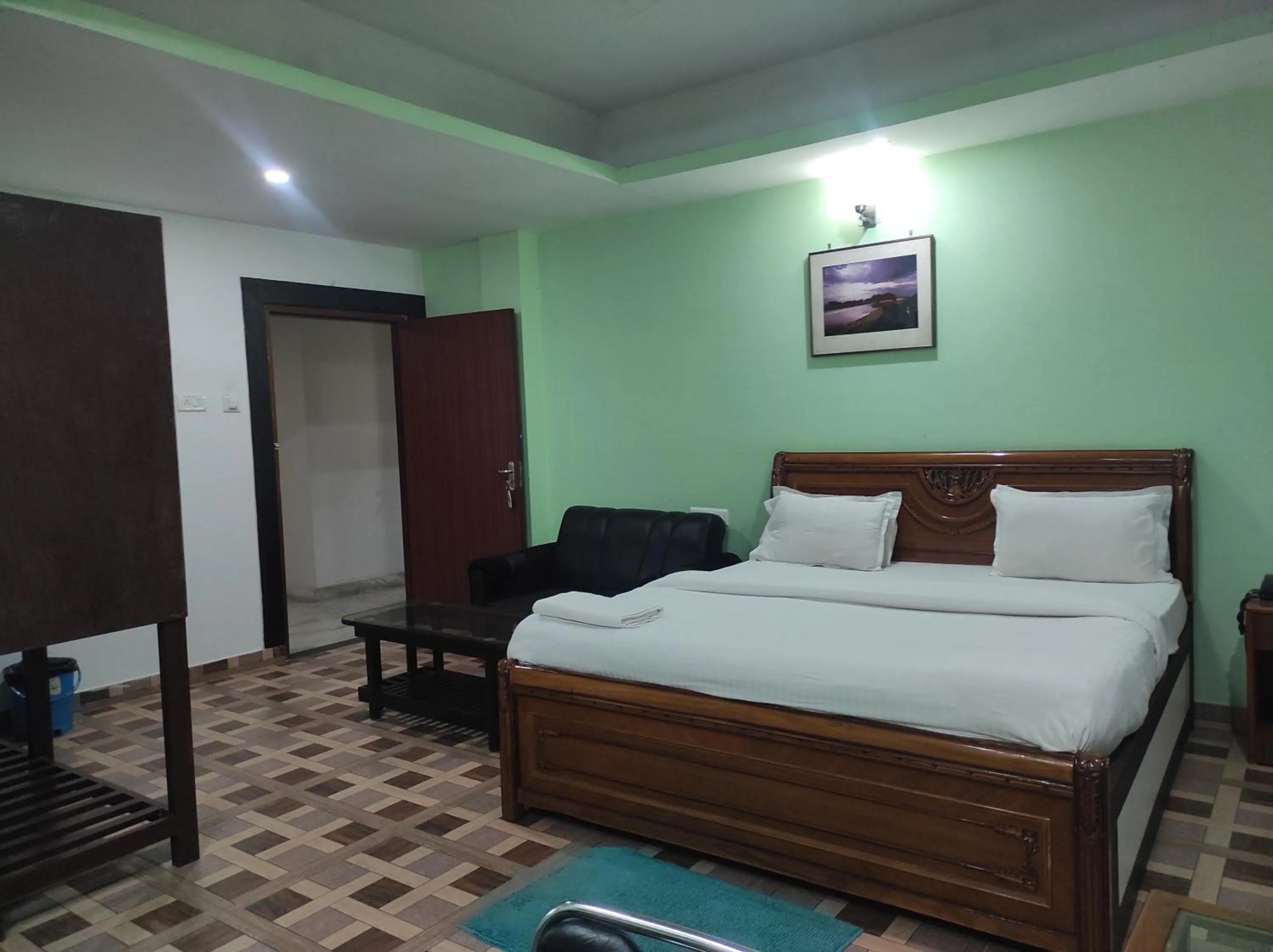 Bed in Hotel Sanjivani Heritage Top Best Budget Hotels in Dibrugarh, Assam