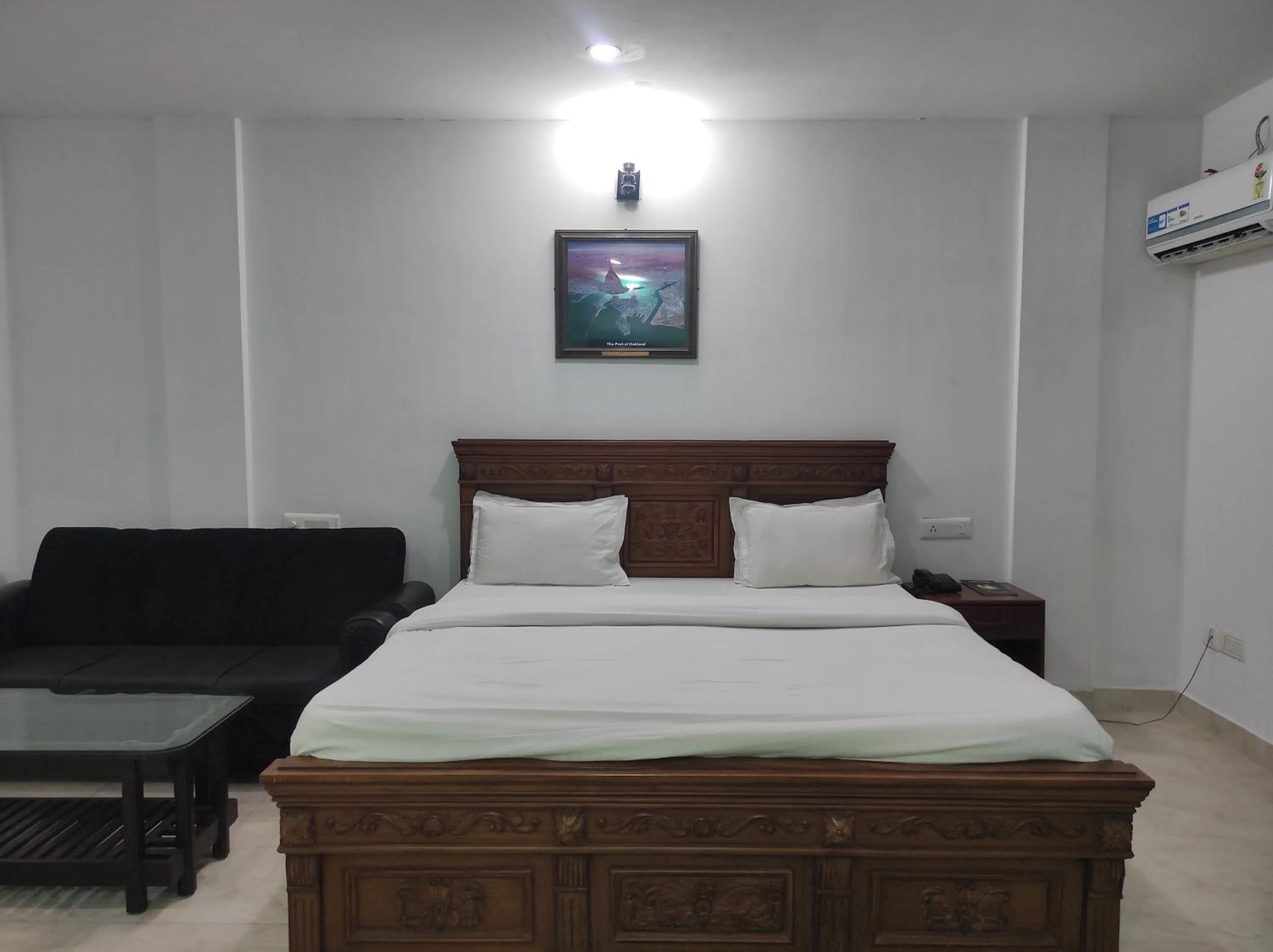 Bed in Hotel Sanjivani Heritage Top Best Budget Hotels in Dibrugarh, Assam